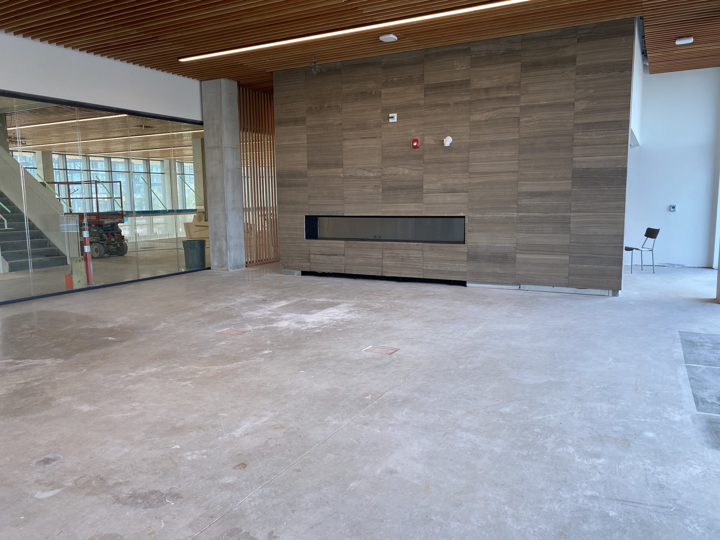  Level 2 of  Hazel McCallion Campus Student Centre and Athletic Building. features a quiet room with a fireplace.  