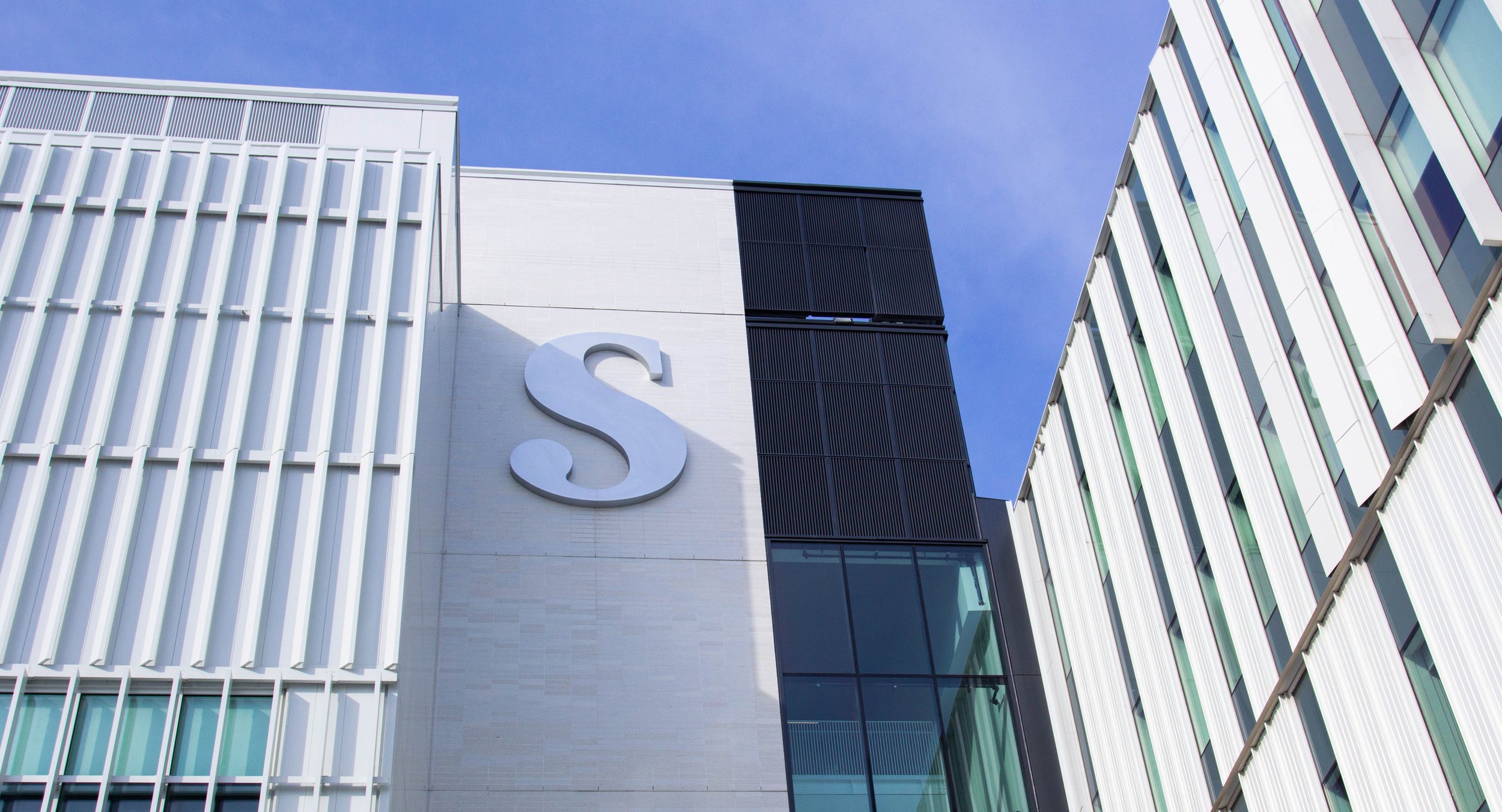  Sheridan College Hazel McCallion Student Centre, exterior view with a giant S on the front of the building.  