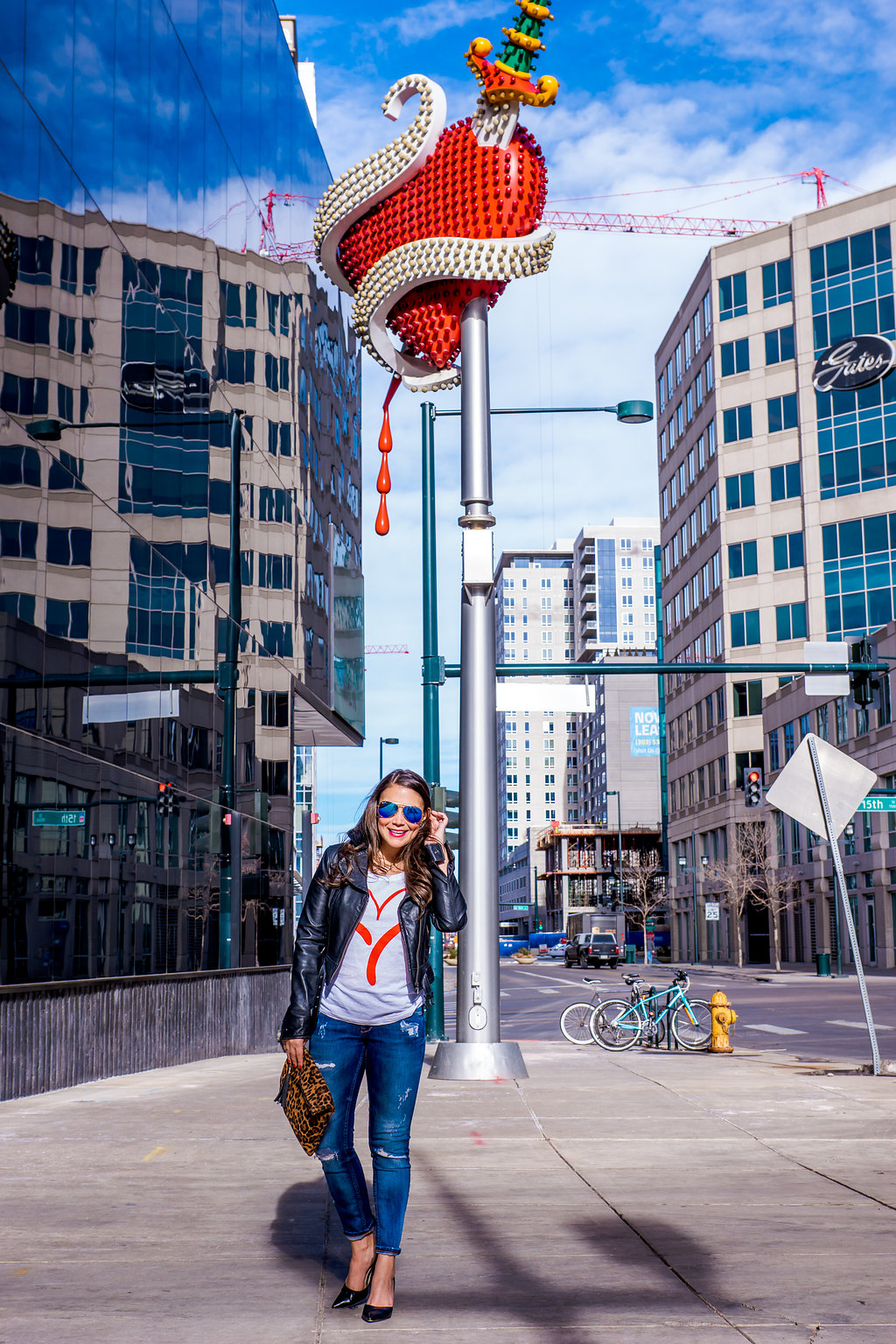  Heart graphic tee, leather jacket and distressed jeans supporting the American Heart Association and Go Red For Women 