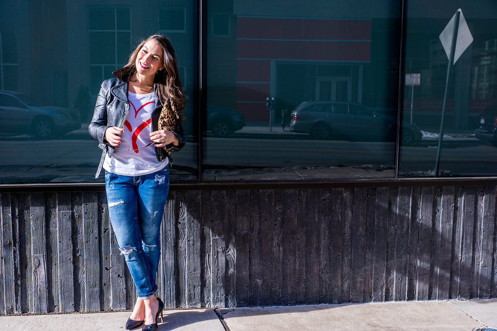  Heart graphic tee, leather jacket and distressed jeans supporting the American Heart Association and Go Red For Women 