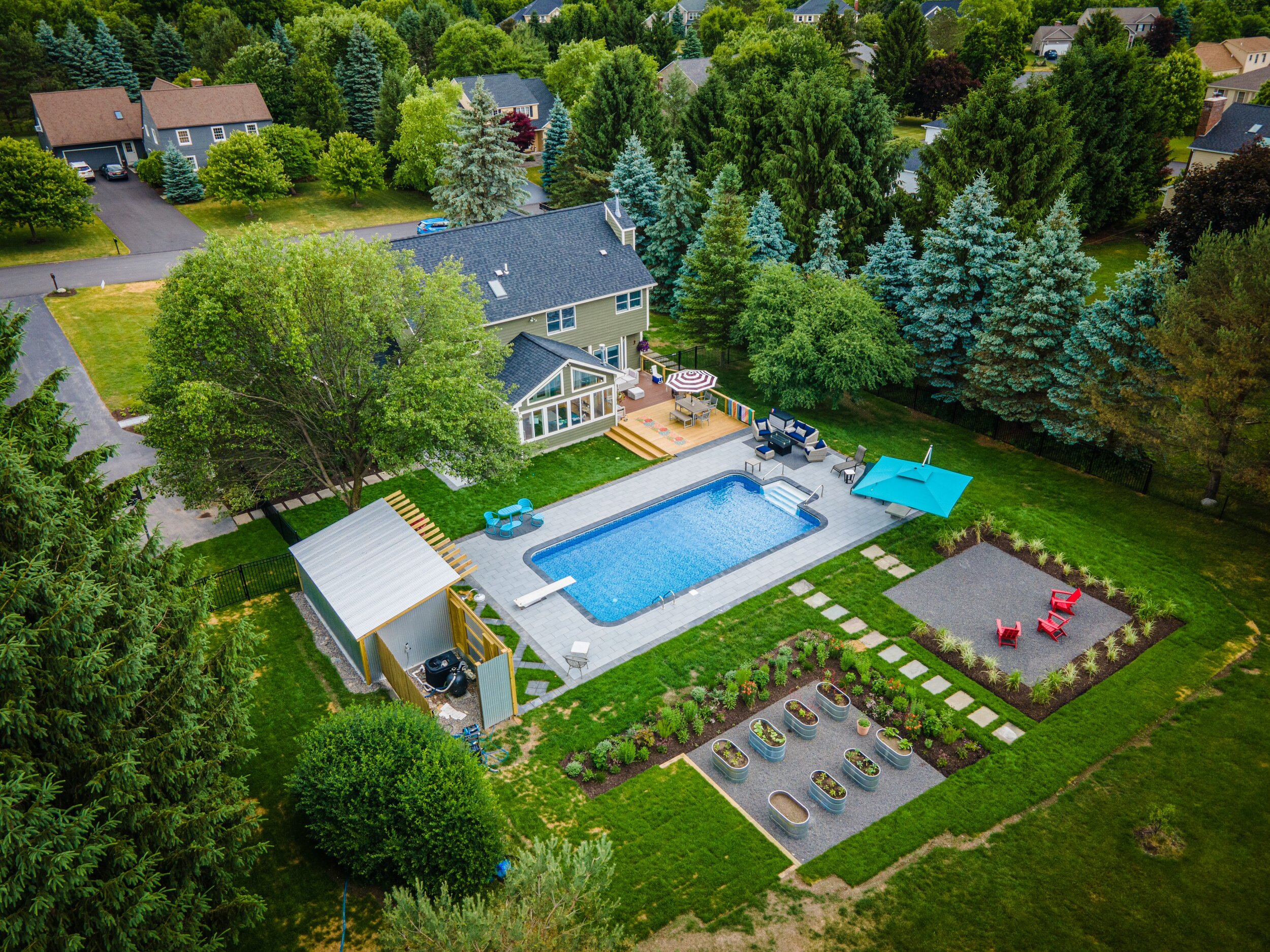 New paving, custom designed pool house and gardens