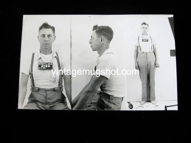 1953 - Man Wearing Suspenders And No Shoes