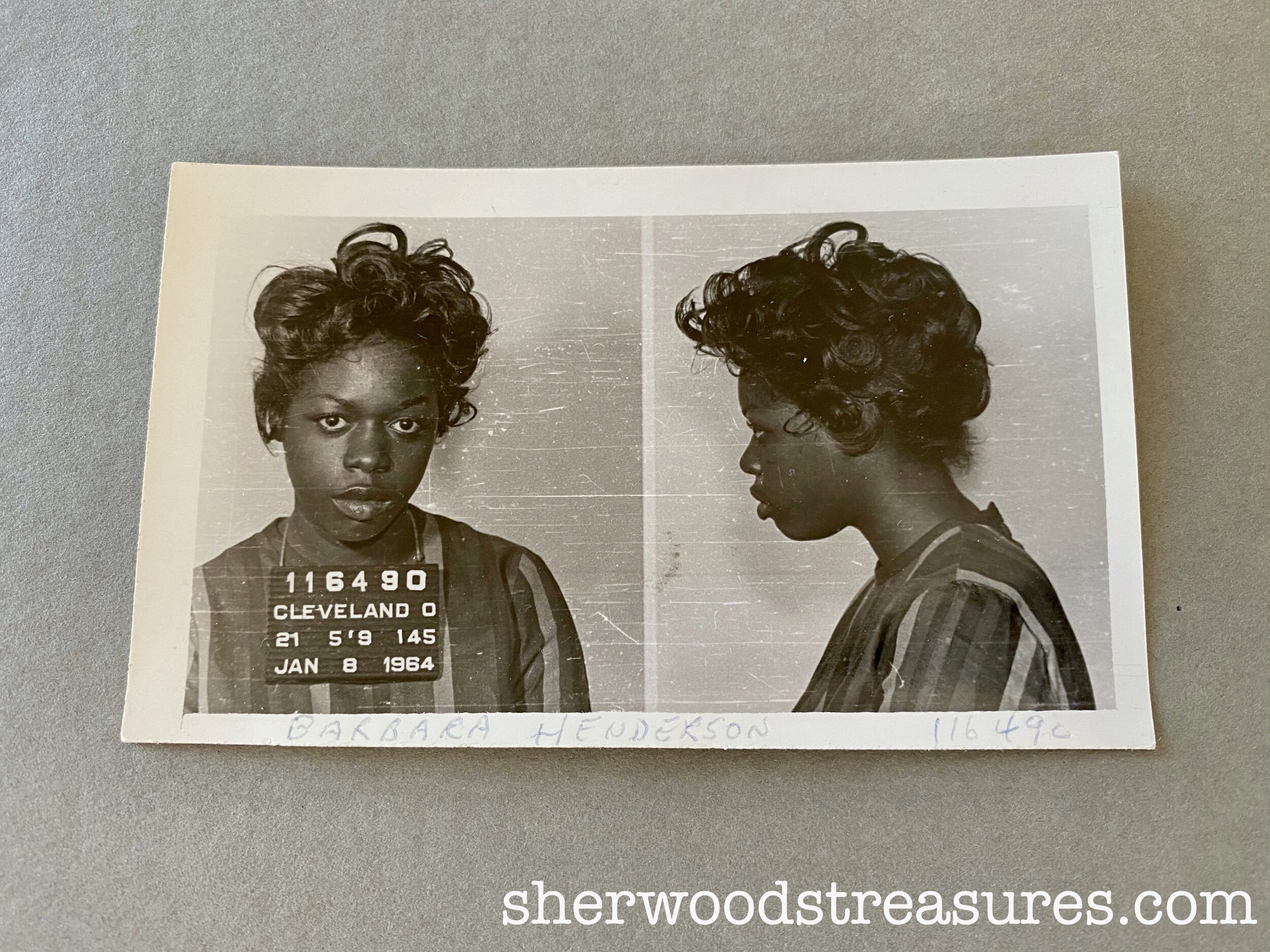 1964 - Young Dark-Skinned Lady in a Striped Dress