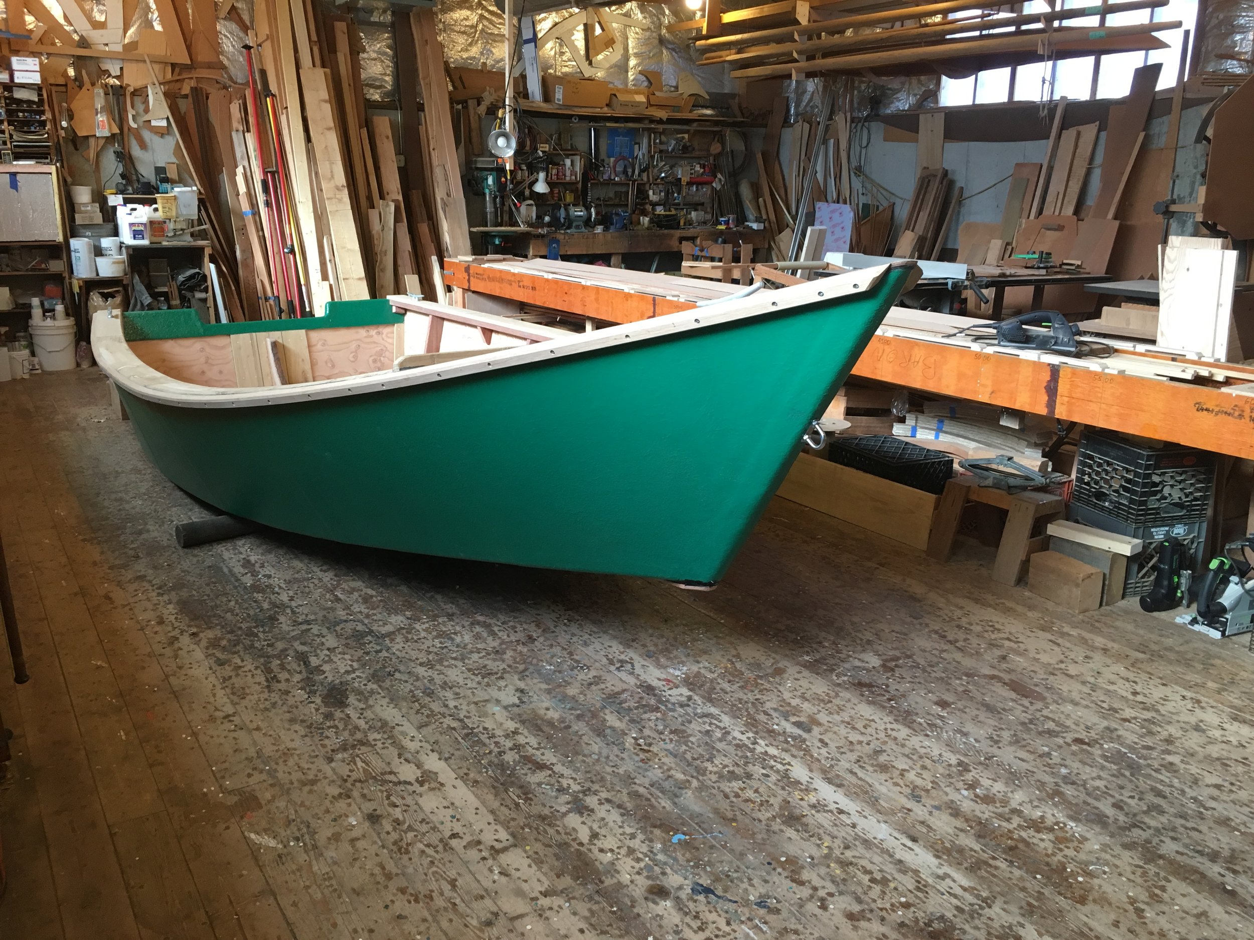 18' Work Skiff, on the rollers and ready to go out the door.