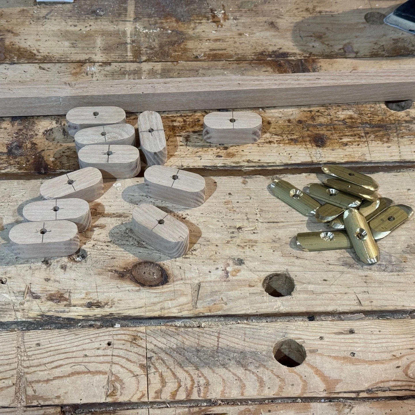 Next I made the floorboards. The first photo shows the toggles that hold down the floorboards ready for installation. Second photo shows the forward section installed. The floorboards are white cedar, 1/2&quot;, same as the planking. Third photo show