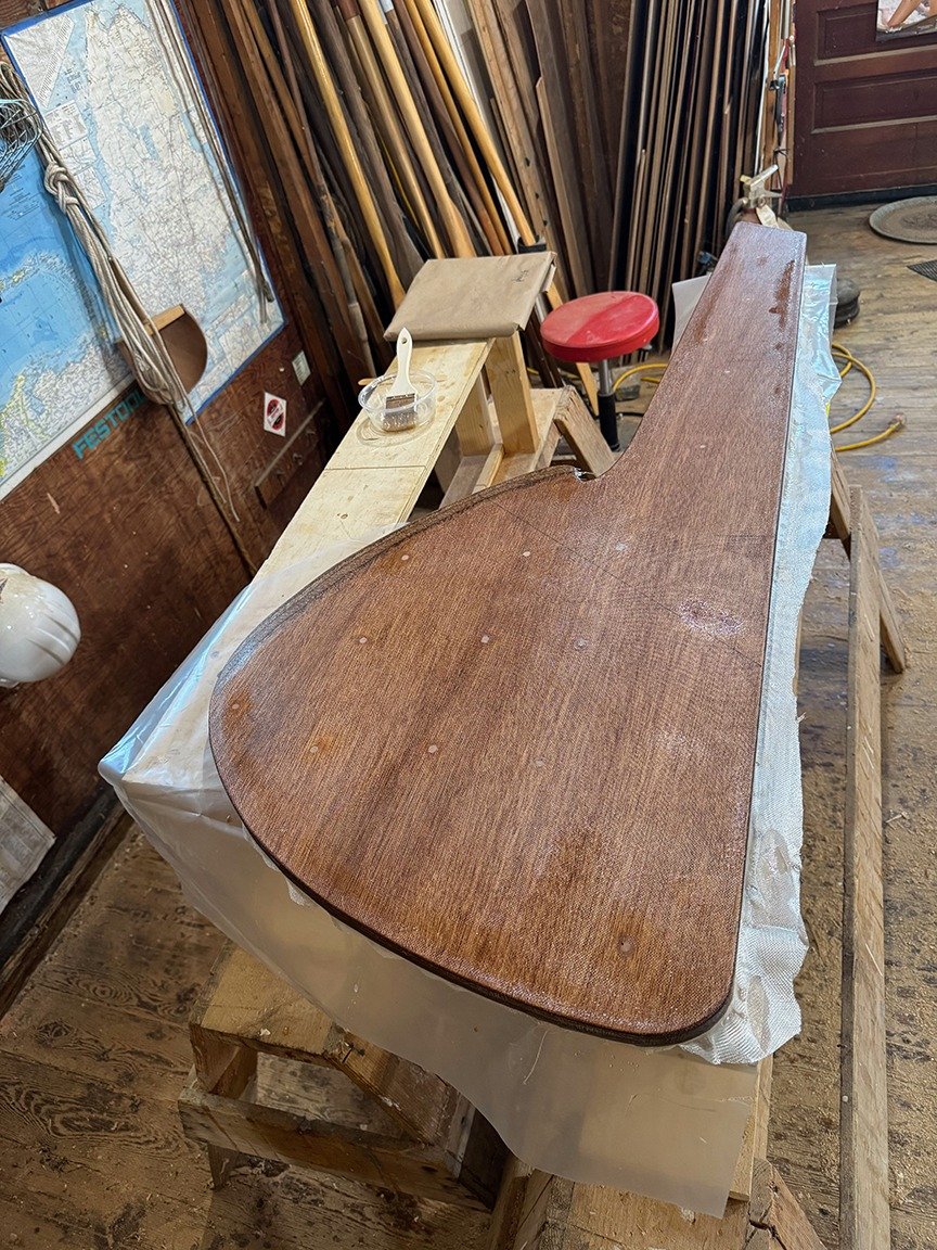 Back on the build of Cove Runner, after a very long intermission!! Photo 1- Meranti Marine Plywood rudder blade/stock sheathed with epoxy and fiberglass cloth. The rudder and centerboard are the only modern composite ply/epoxy/fiberglass pieces in th
