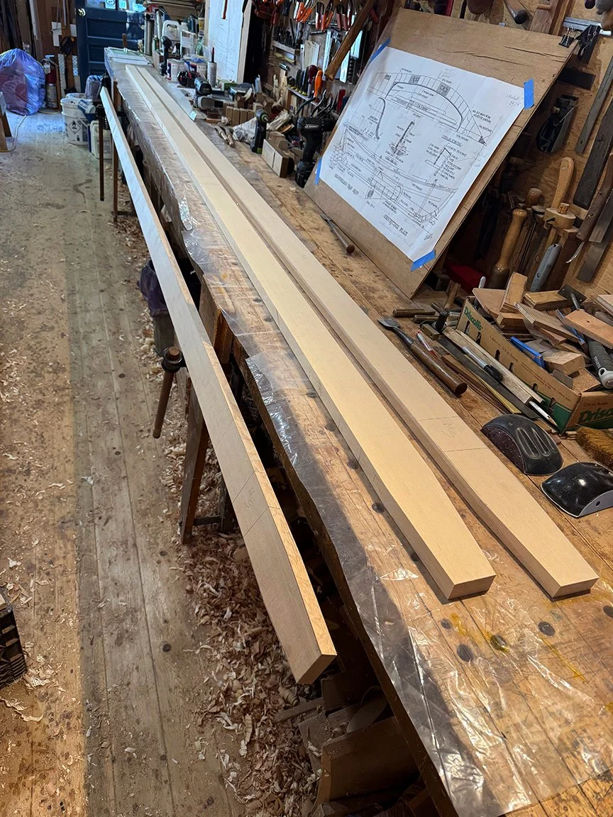 Hi- Summer is here, gas been for a while, so it has been hard to keep posting when I want to be outside...anway, this next series is glueing up the mast blank. The first photo shows the 3 laminations of Sitka Spruce with the tapers rough cut. second 