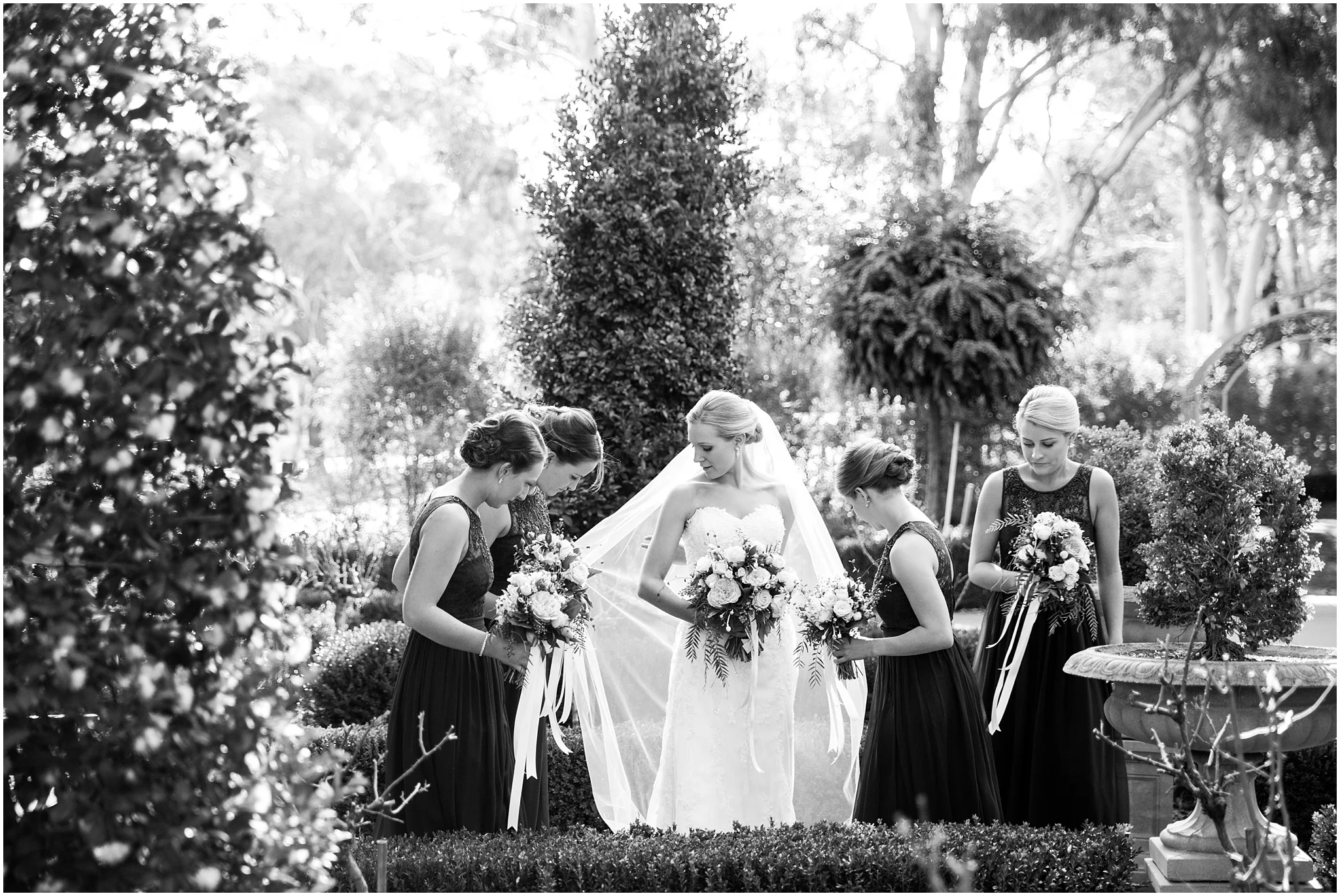 Bride with her bridesmaids at the Gold Creek Chapel near Canberra