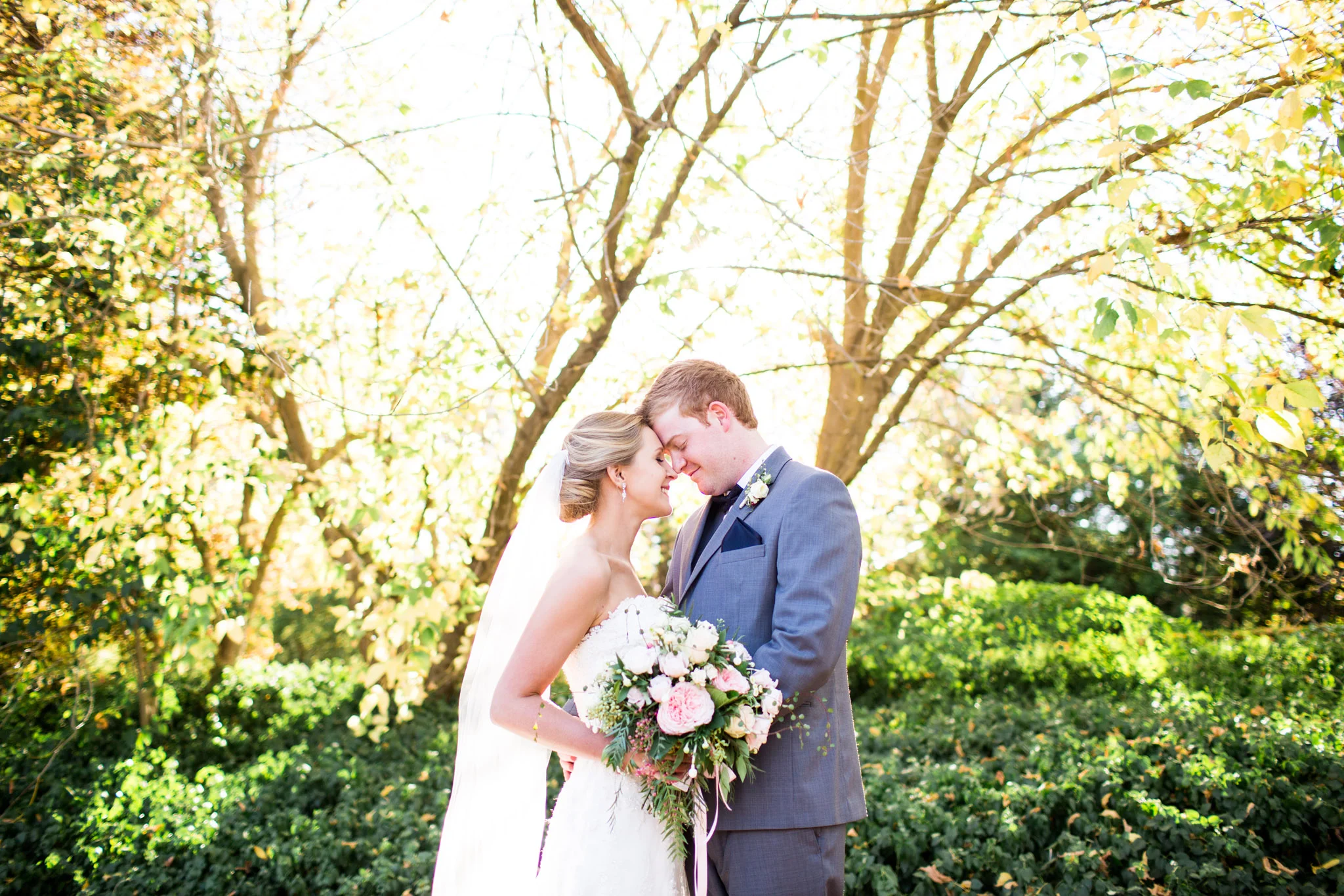 Bride and Groom posing for wedding photos at their Gold Creek Wedding