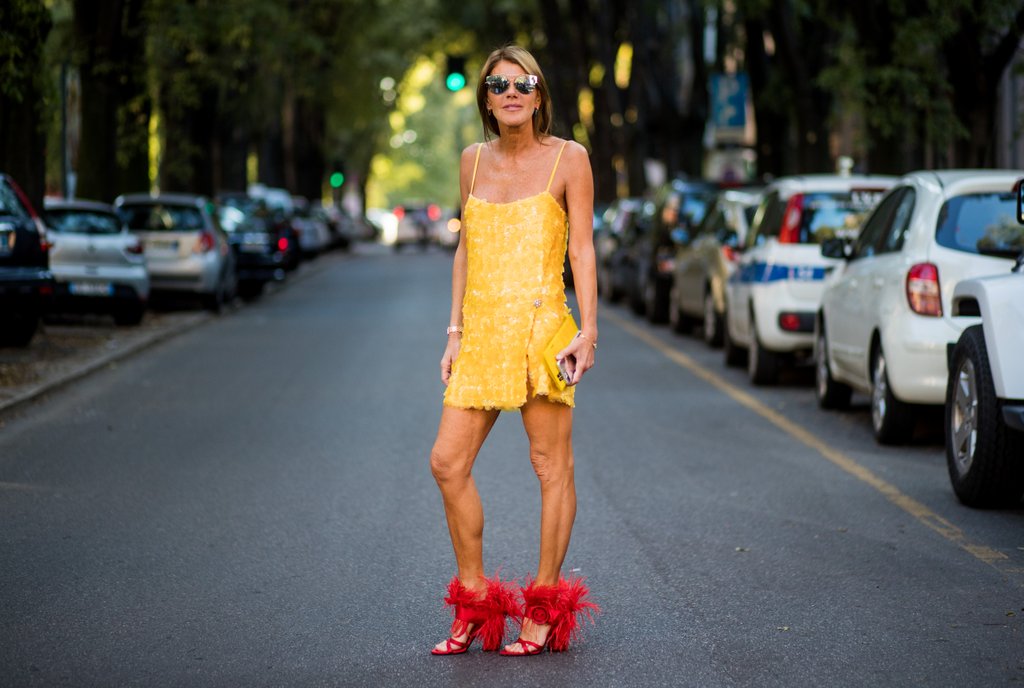 Anna-Dello-Russo-didnt-play-safe-her-marigold-dress.jpg