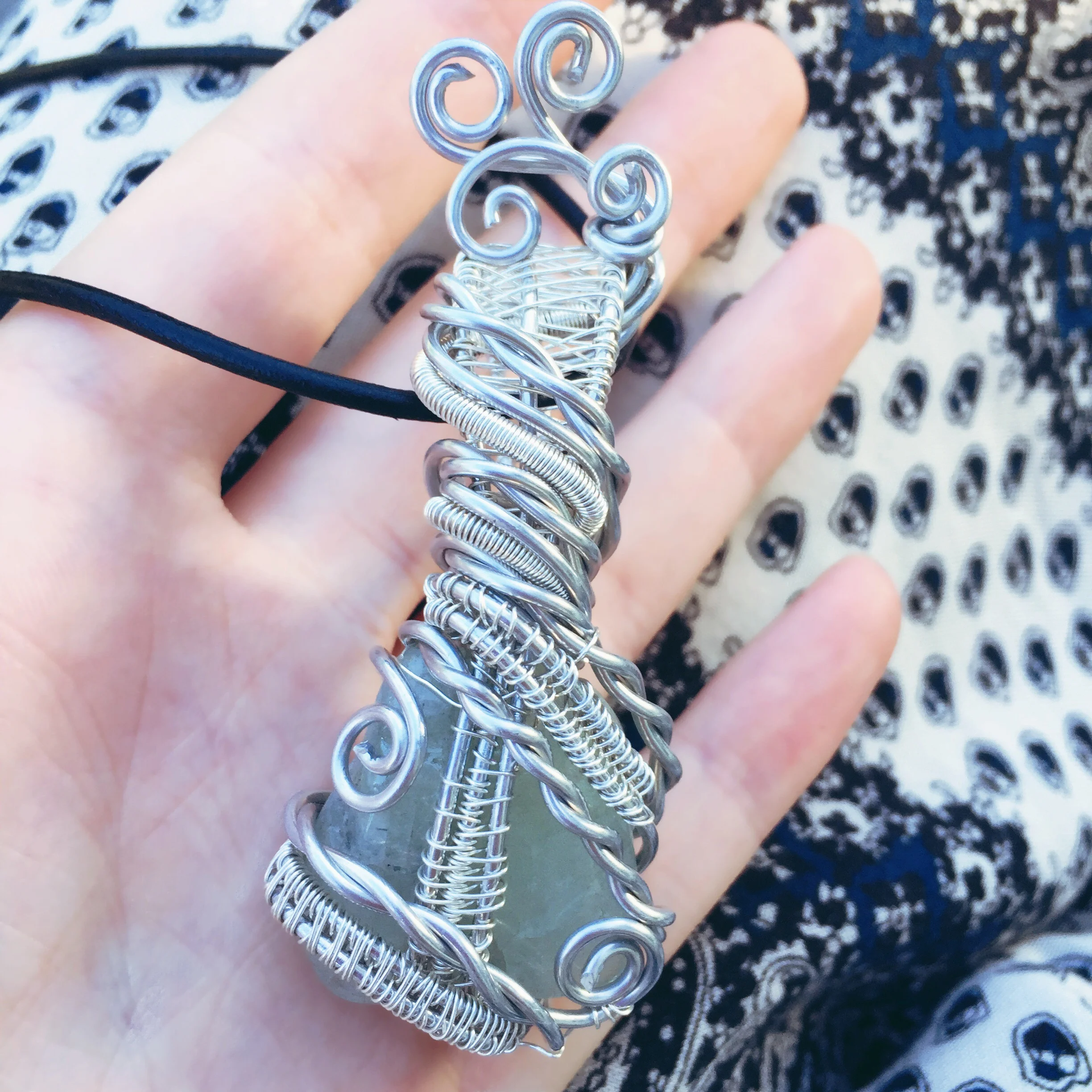 This aquamarine was inspired by beachy things. I saw ropes, waves, and sand while creating this. 