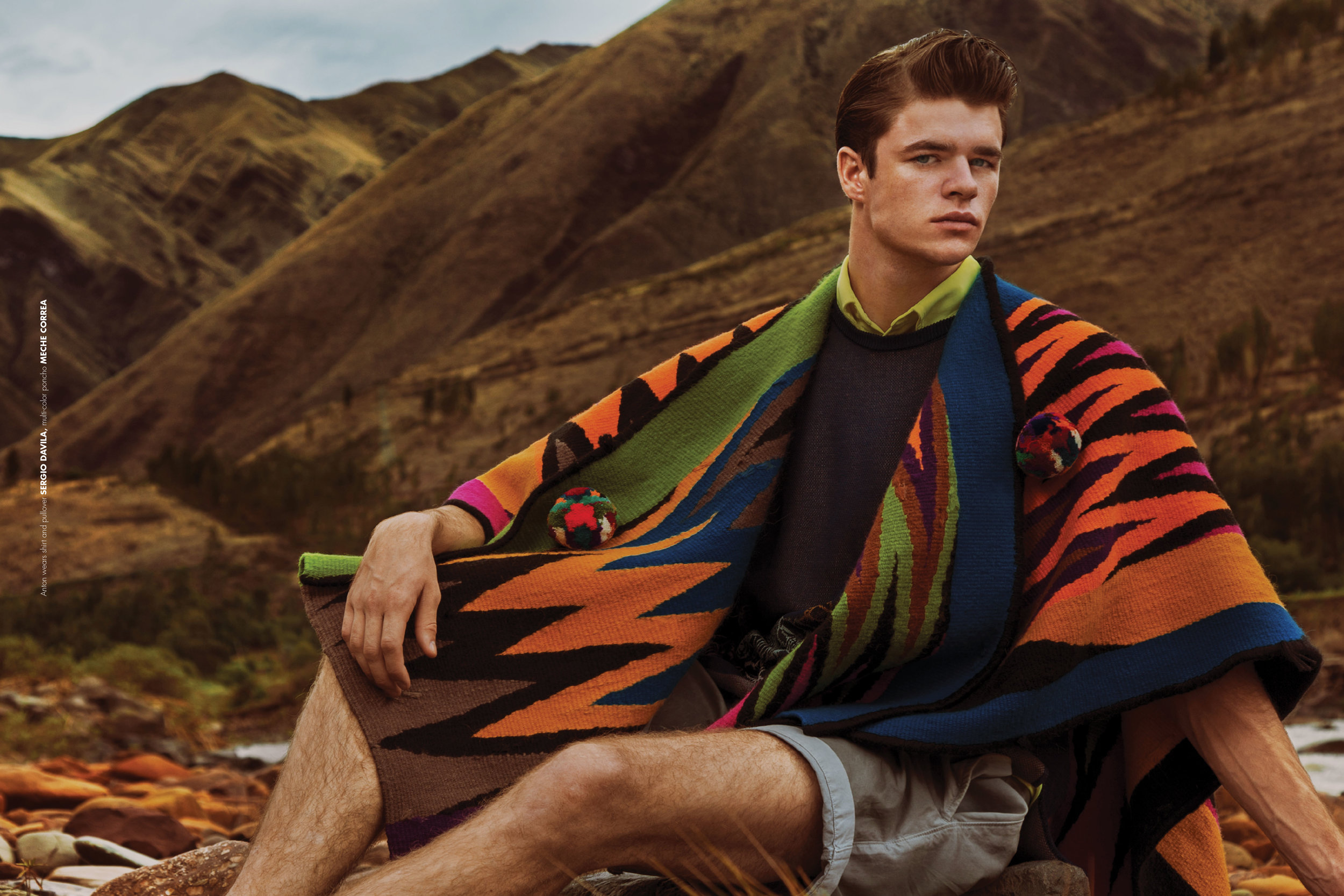 Anton wears shirt and pullover SERGIO DAVILA, multi-color poncho MECHE CORREA