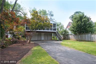 Large rear yard with driveway