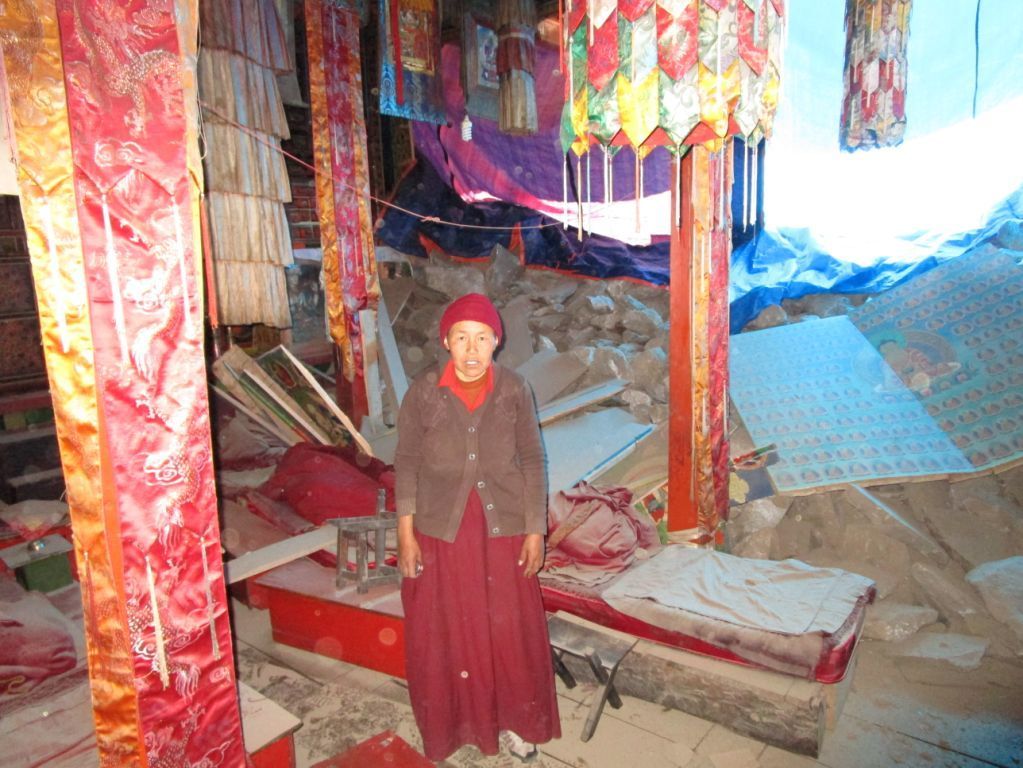 Nun in prayer hall