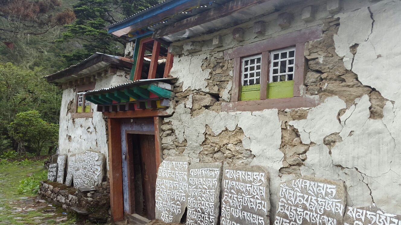 Prayer hall with mani stones.