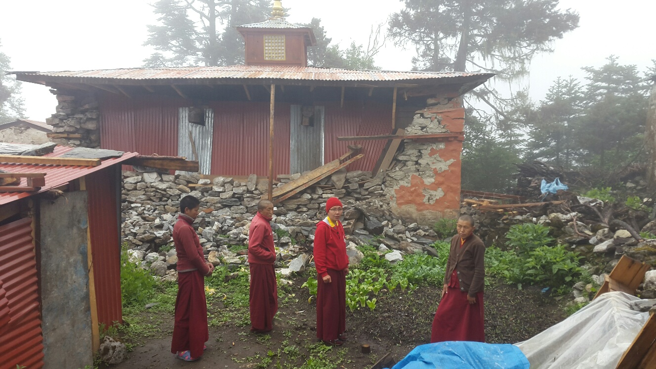 Nuns trying to lay tarps on hall