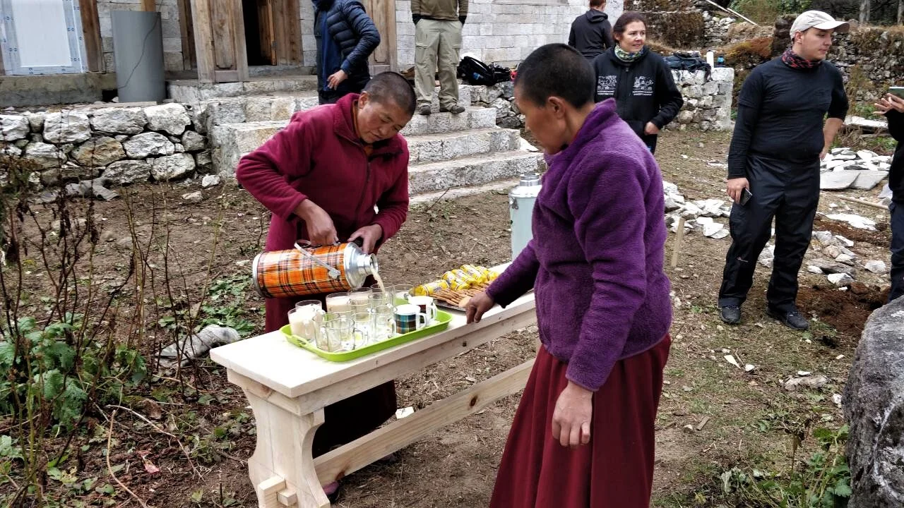 fall 2018 nuns prepare tea for all during a break.jpeg