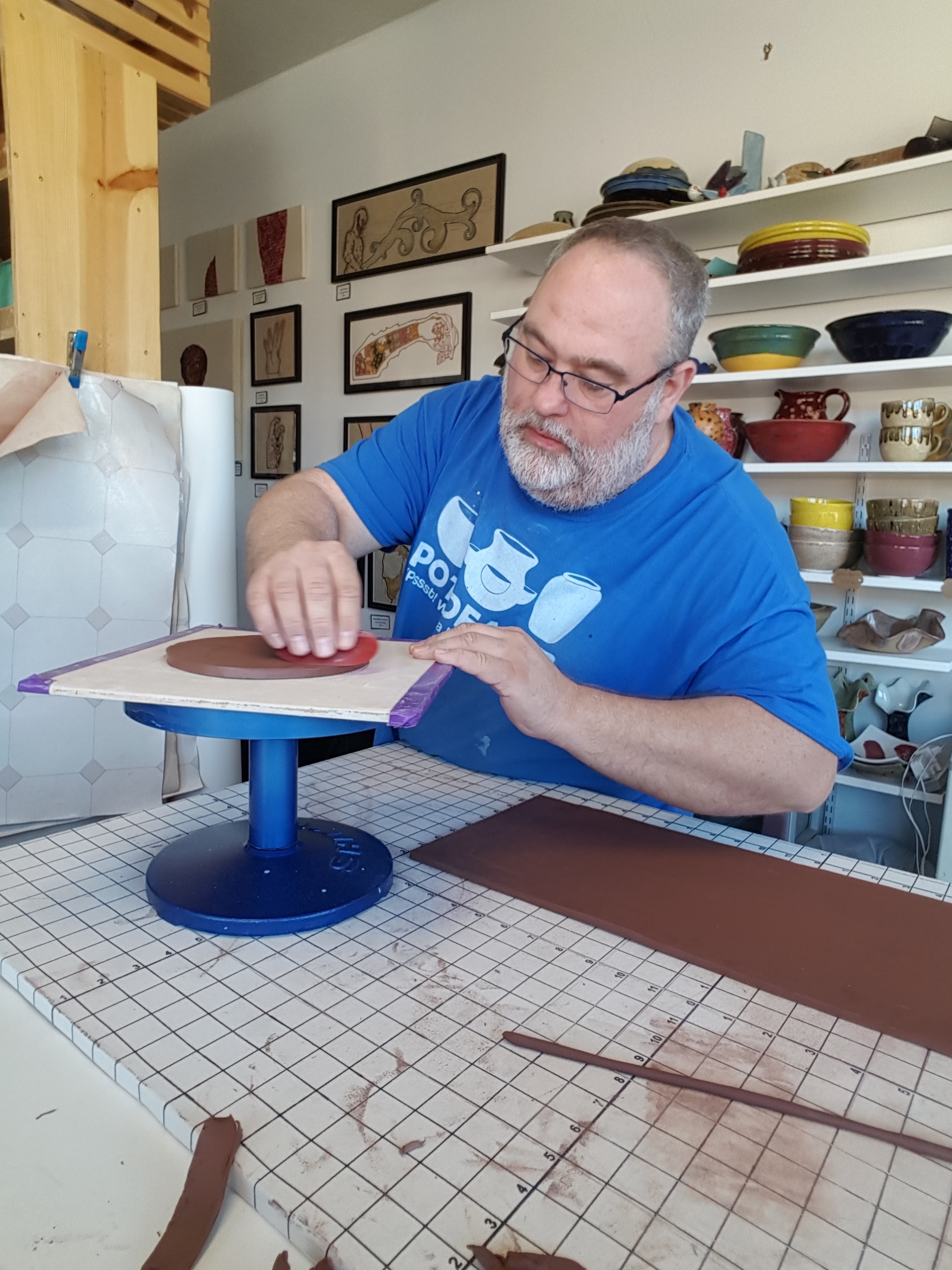 Here clay has been rolled out. I have a rectangular piece, a coil and a round piece. These three will form a cylindrical spooky Halloween form.