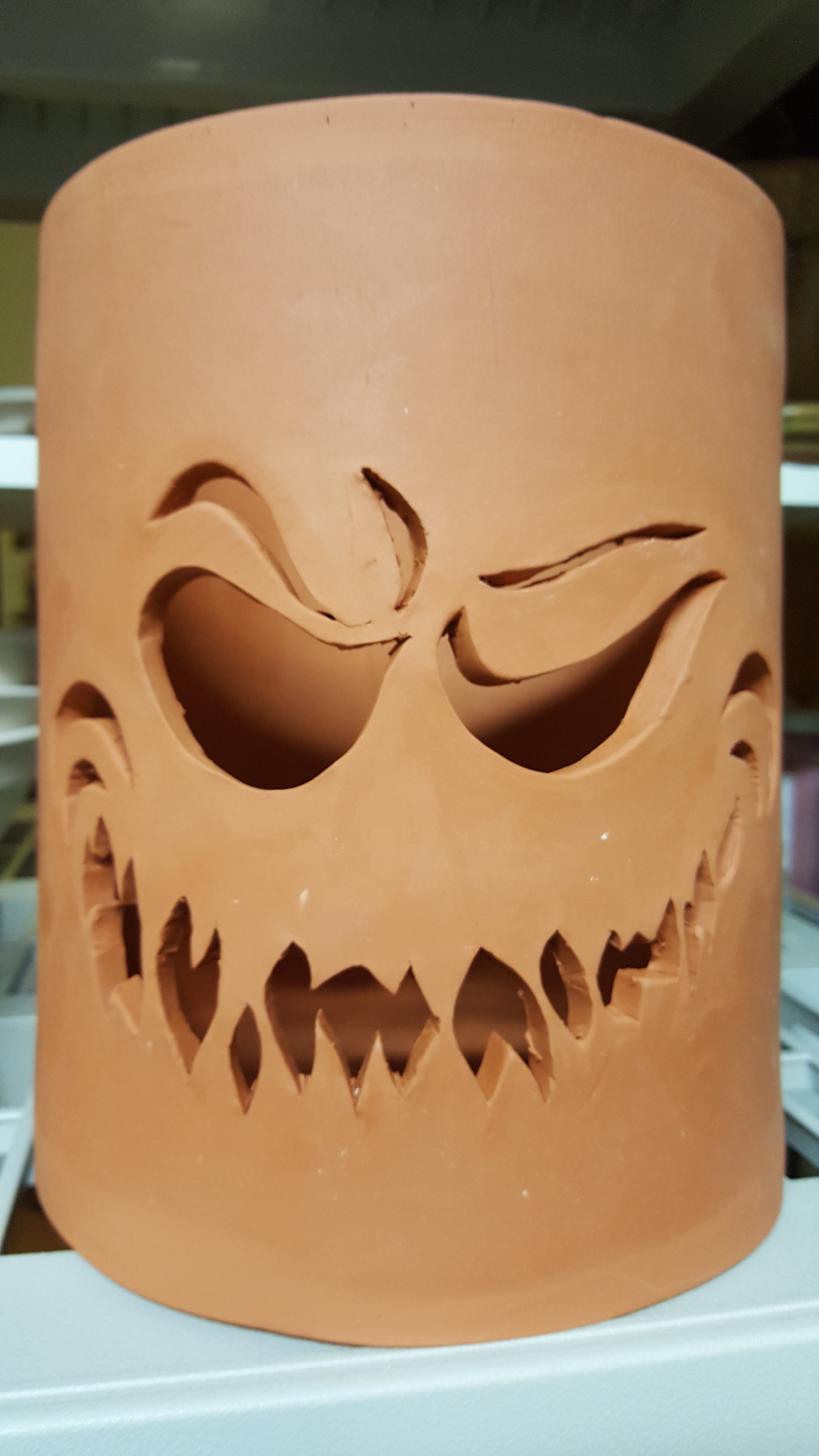 The finished bisque fired piece, ready for glazing.