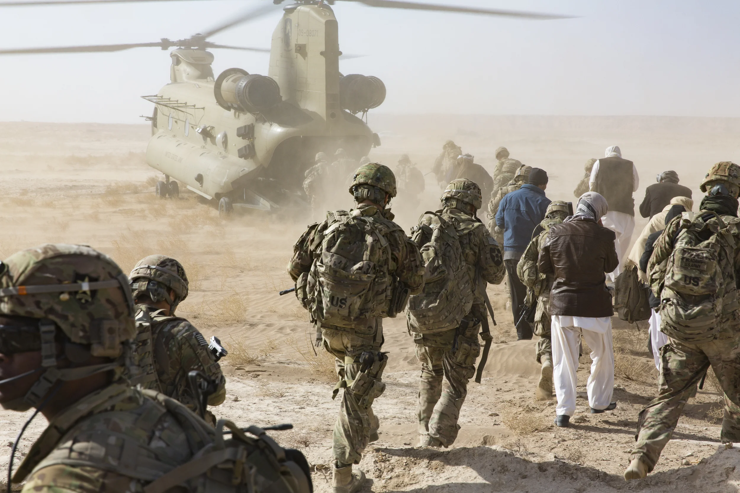 US Army Soldiers and Farahi leaders board a chinook helicopter in Lash-e Juwayn to return to Forward Operating Base Farah, Afghanistan