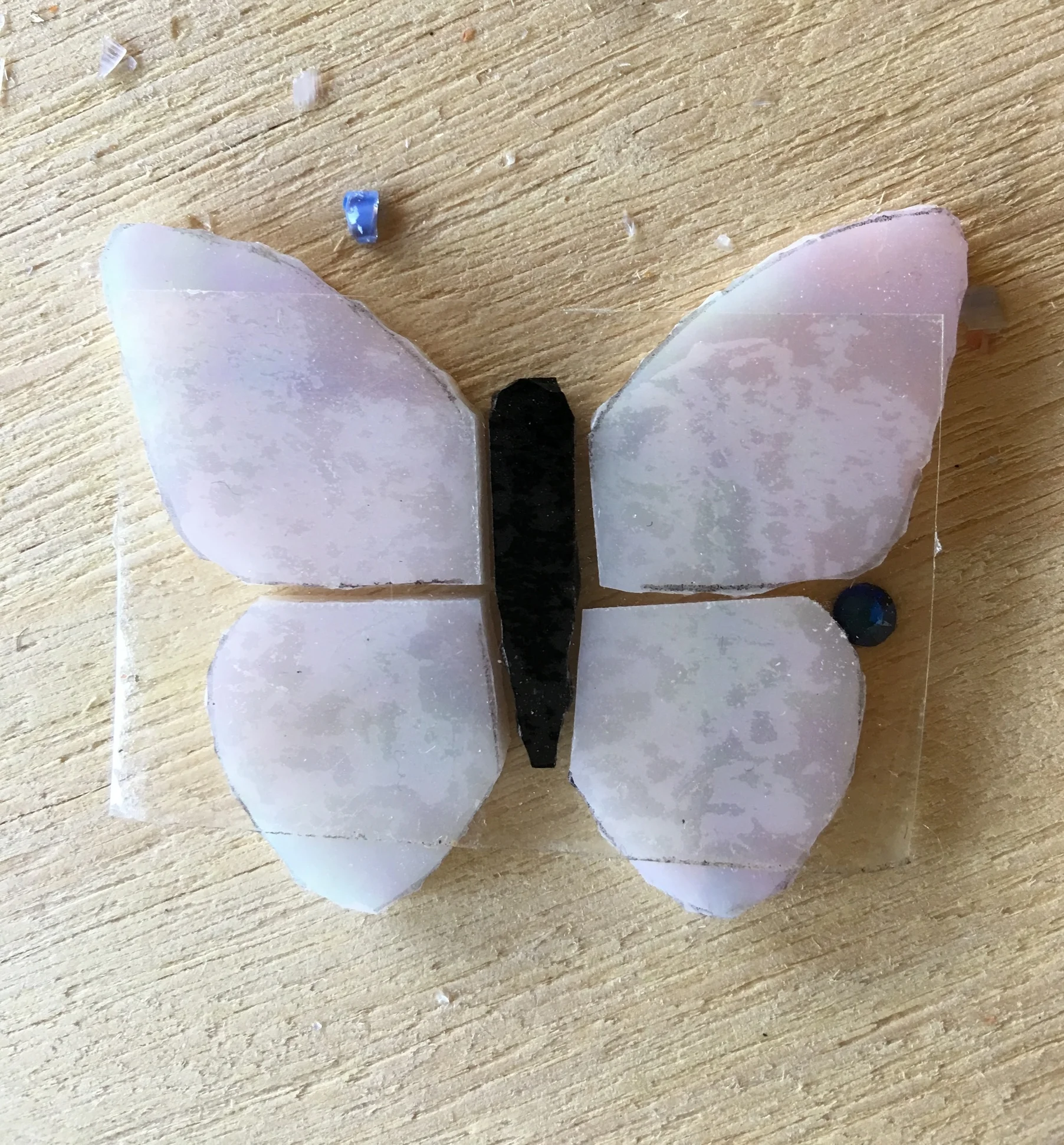 One of the mosaic butterflies templated up on sticky back plastic.