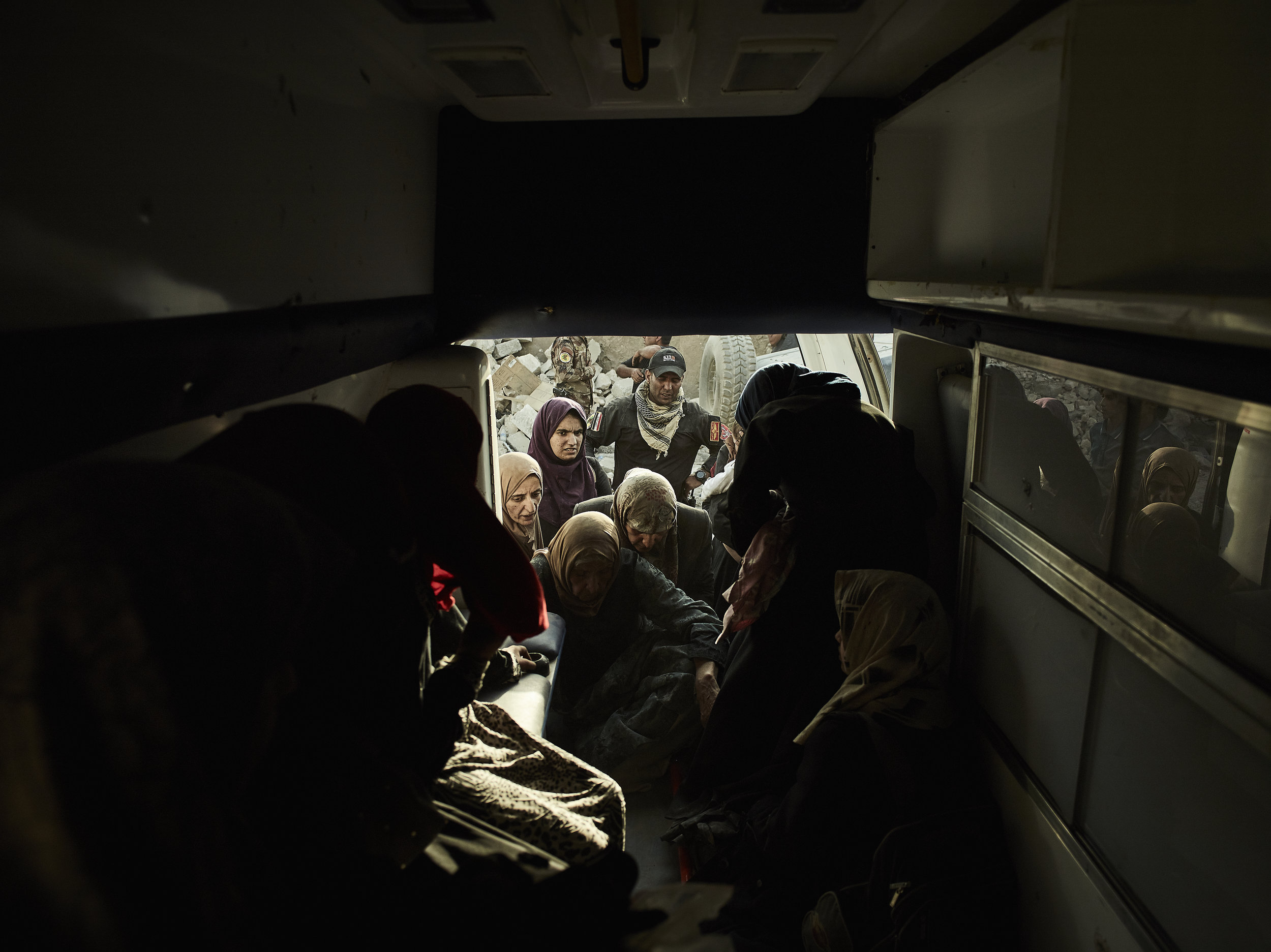 Medics evacuating civilians from fighting in West Mosul