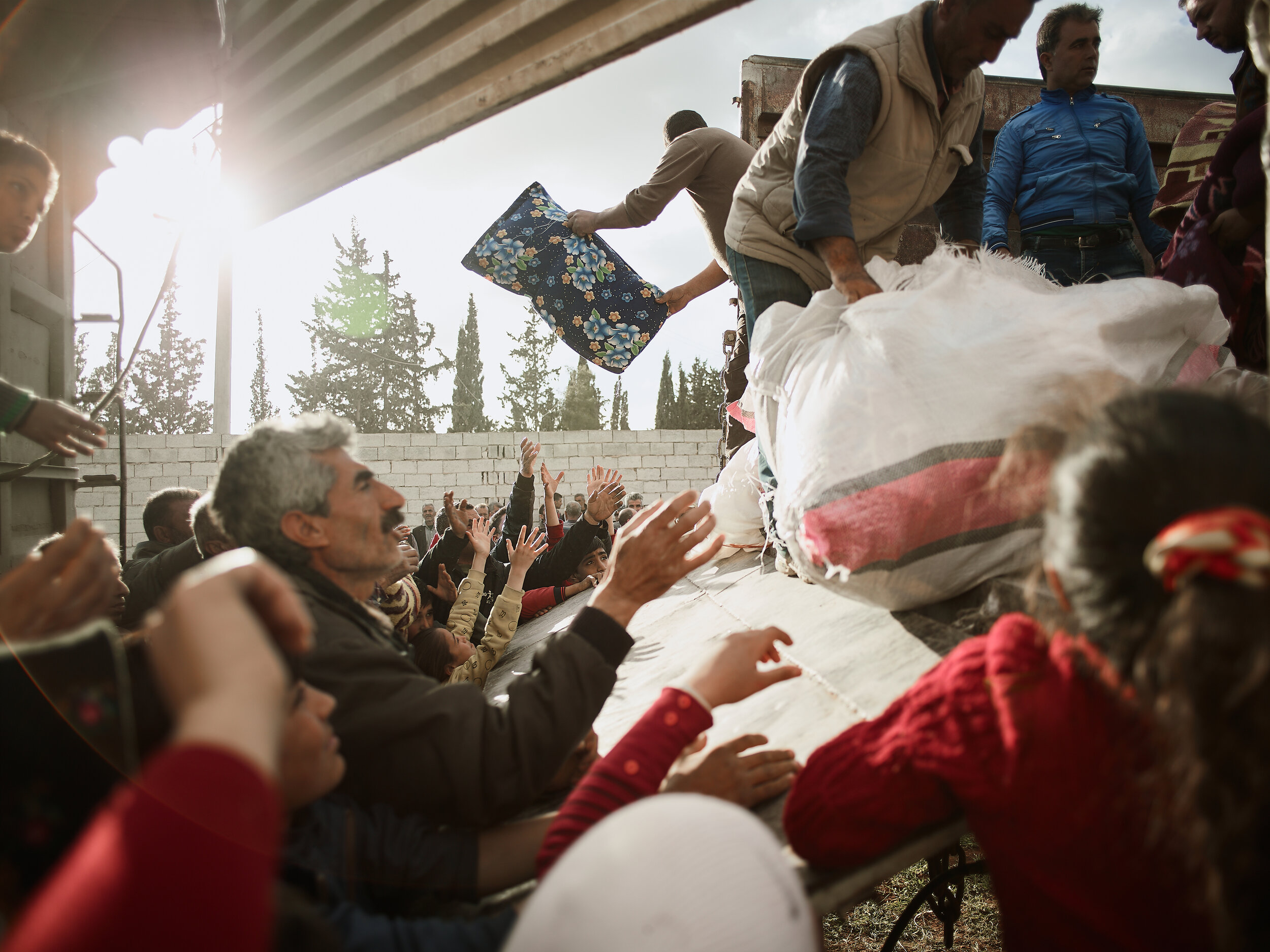 Civilians receiving humanitarian aid near Afrin