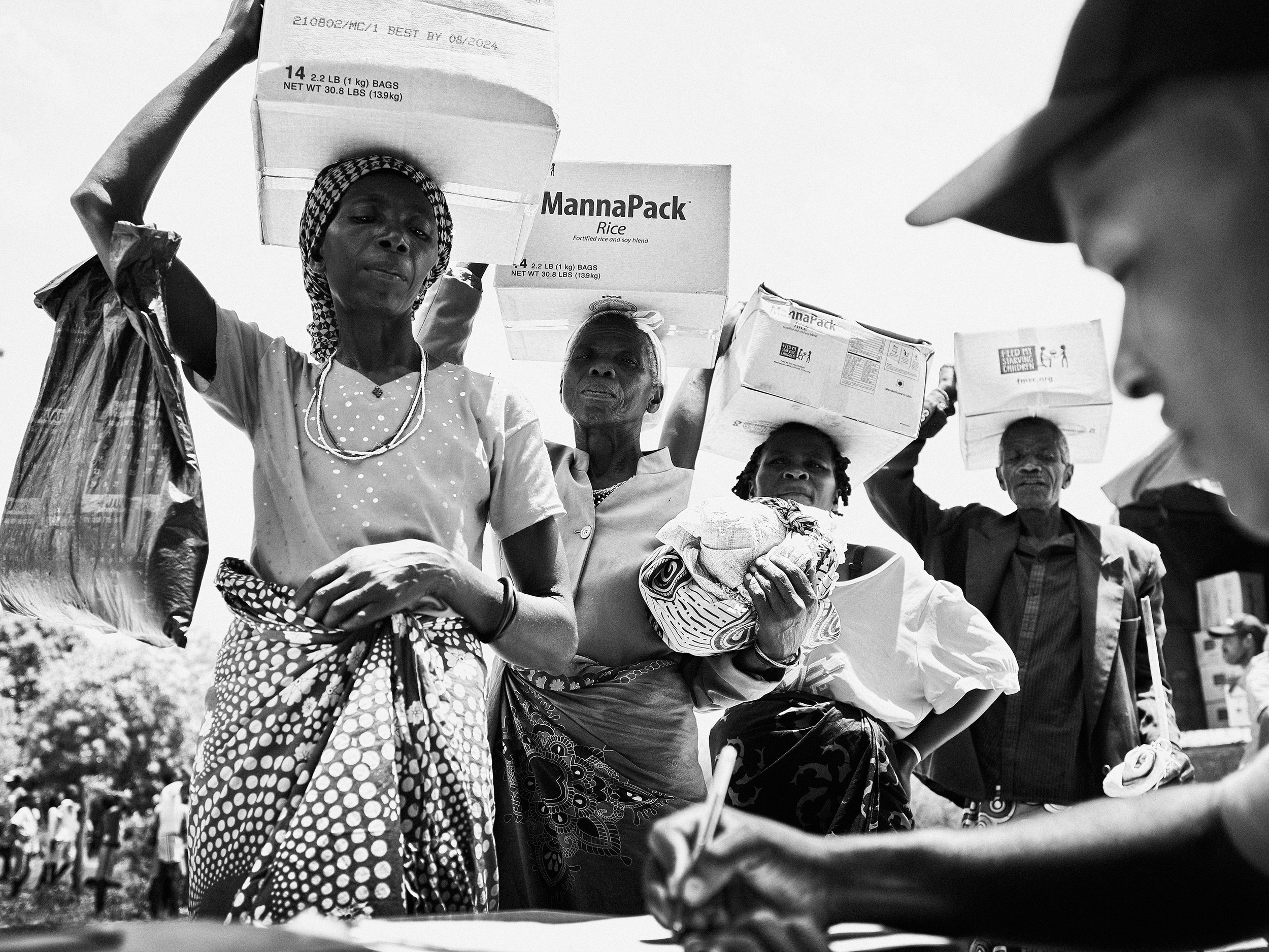Locals receiving humanitarian aid, Angola