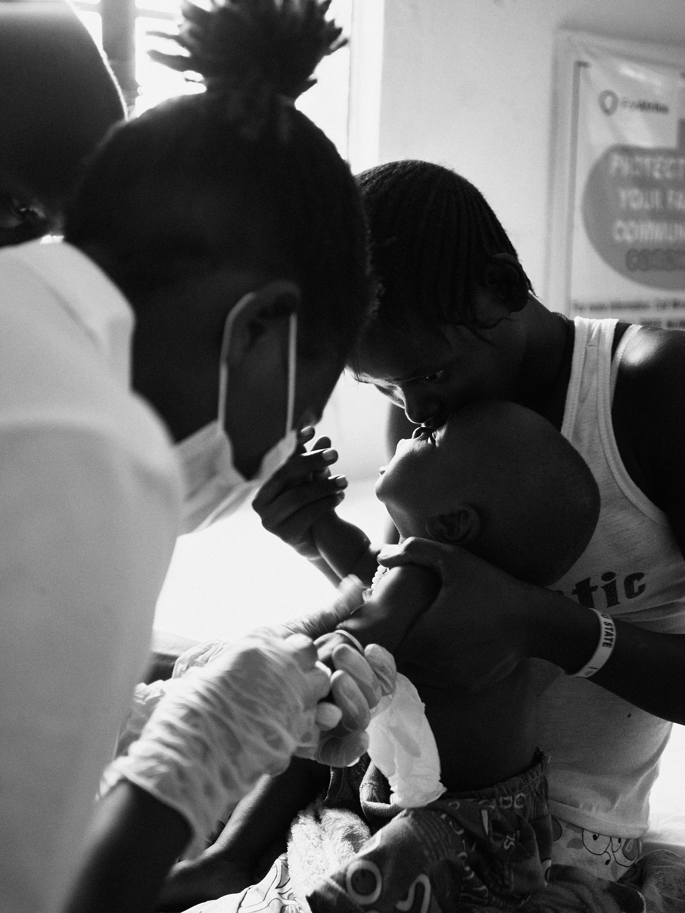 Child receiving vaccinations, Juba, South Sudan