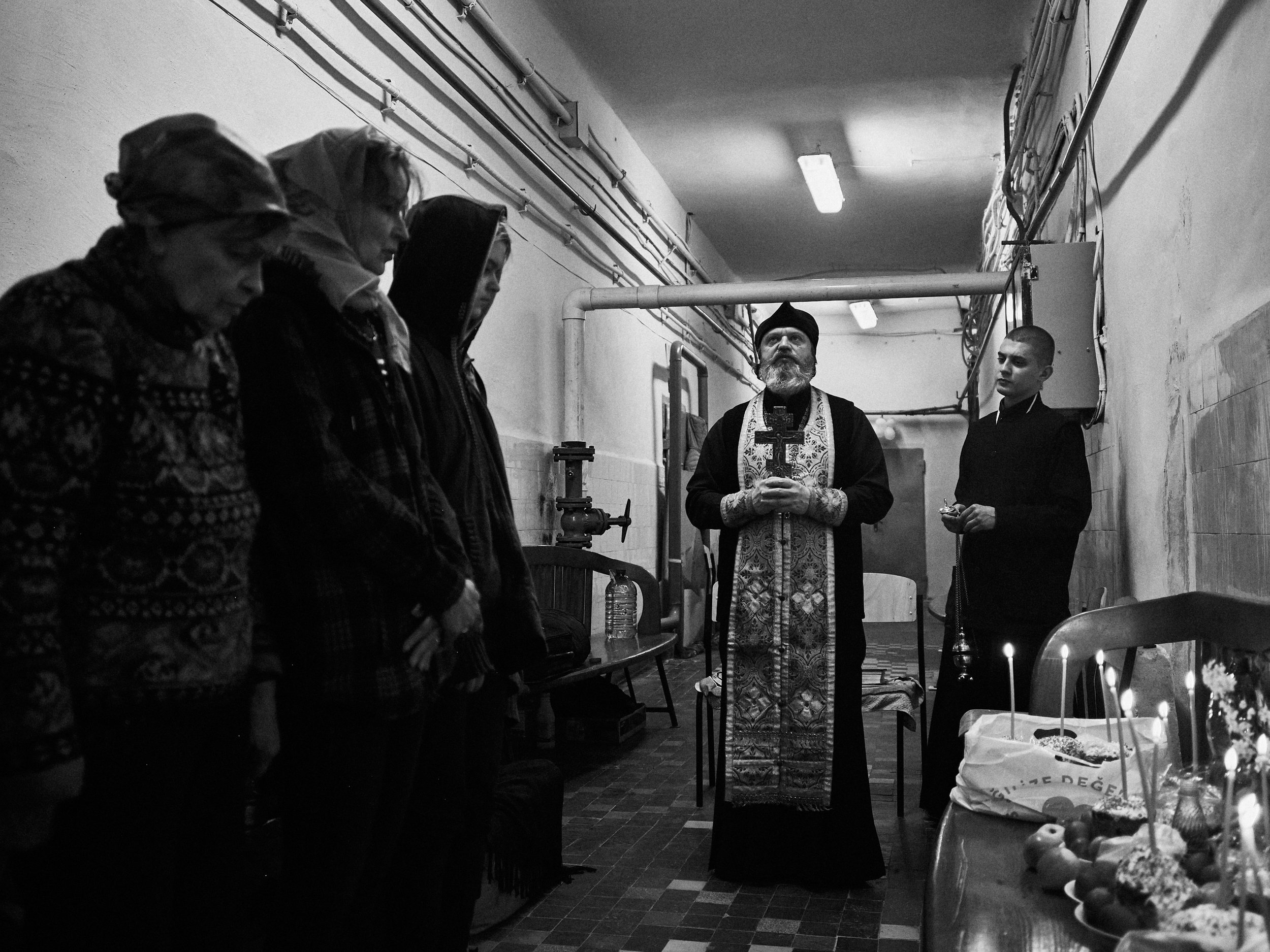 Civilians celebrate Easter in an underground shelter, Kharkiv Oblast