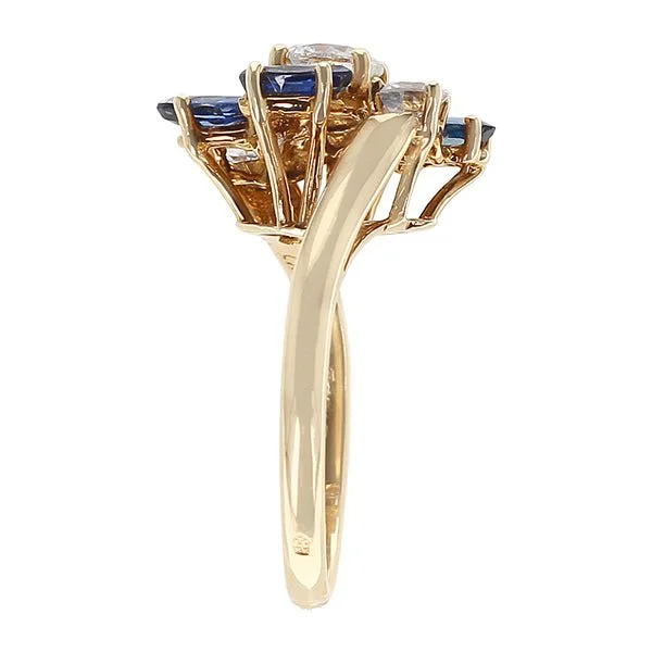 Chaumet_ParisMarquiseSapphireandRoundDiamondRing_18KaratYellowGold6_600x.jpg