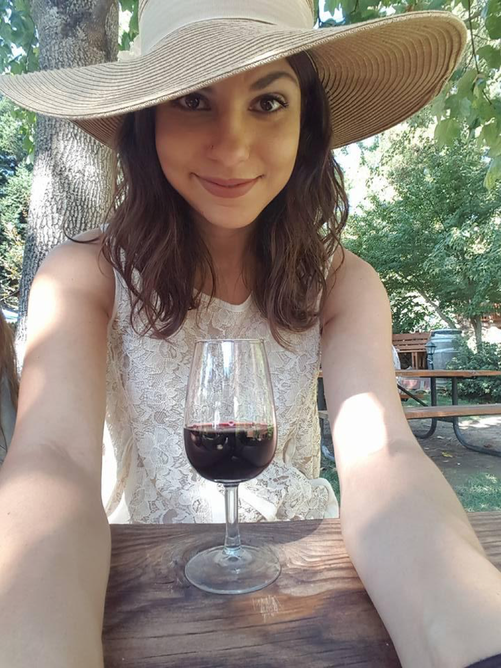 Chelsey With Wine.png