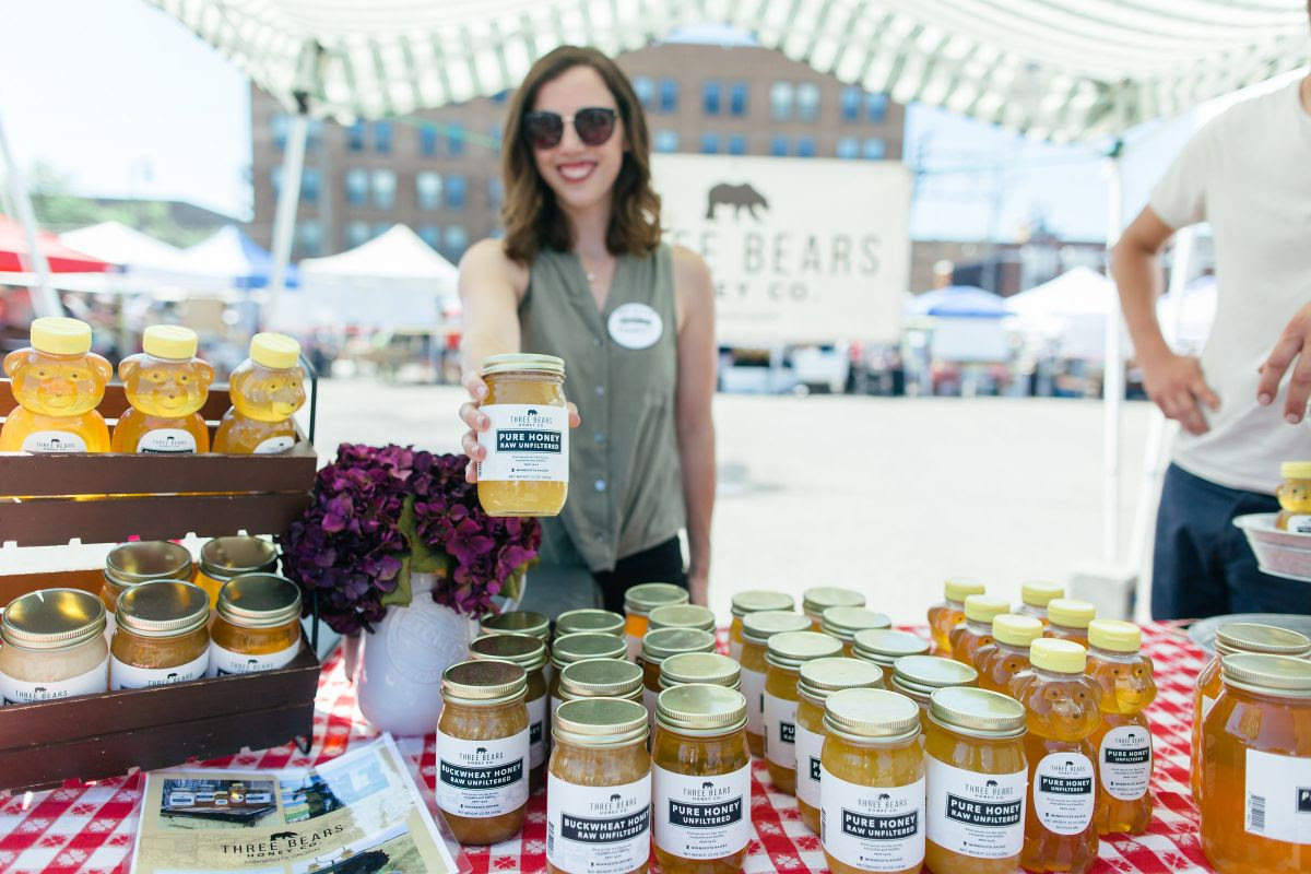 Brittany Luthi at the Three Bears Honey Co. Booth, photo by M.Schleif Photography.