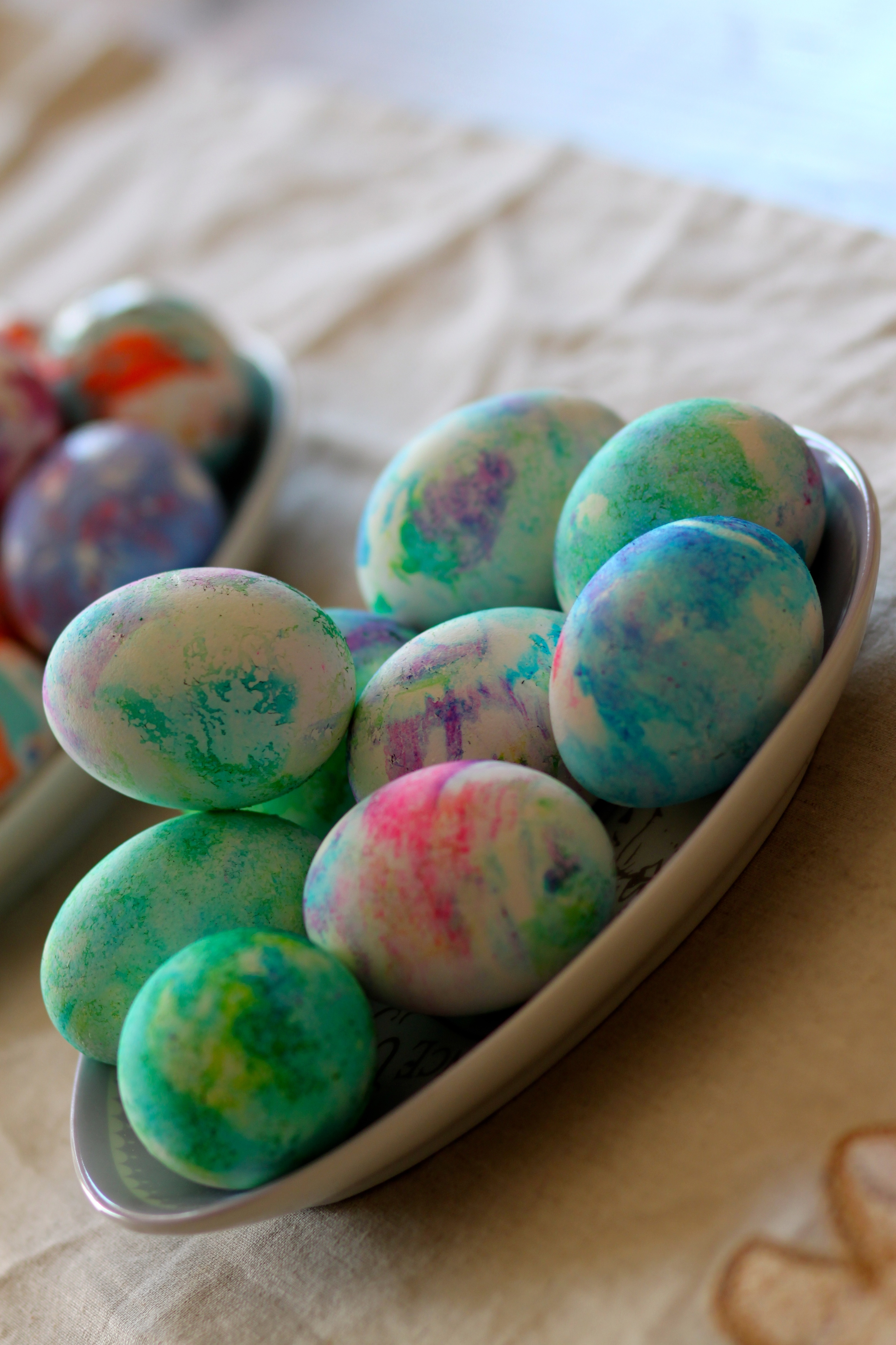 I'm no Rechenka so we rolled our eggs in cool whip and food coloring :)