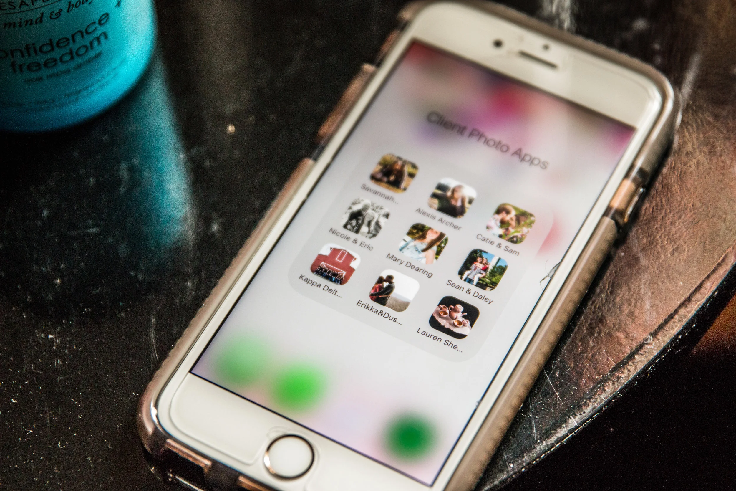 I keep all of my client's personalized apps on my phone so I can show them off to everyone! You're not the only ones that love your photos.