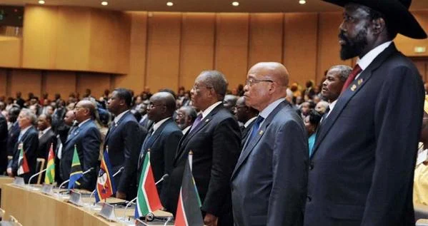 In this picture, there are at least two African leaders who risk prosecution by the ICC. Guess who?