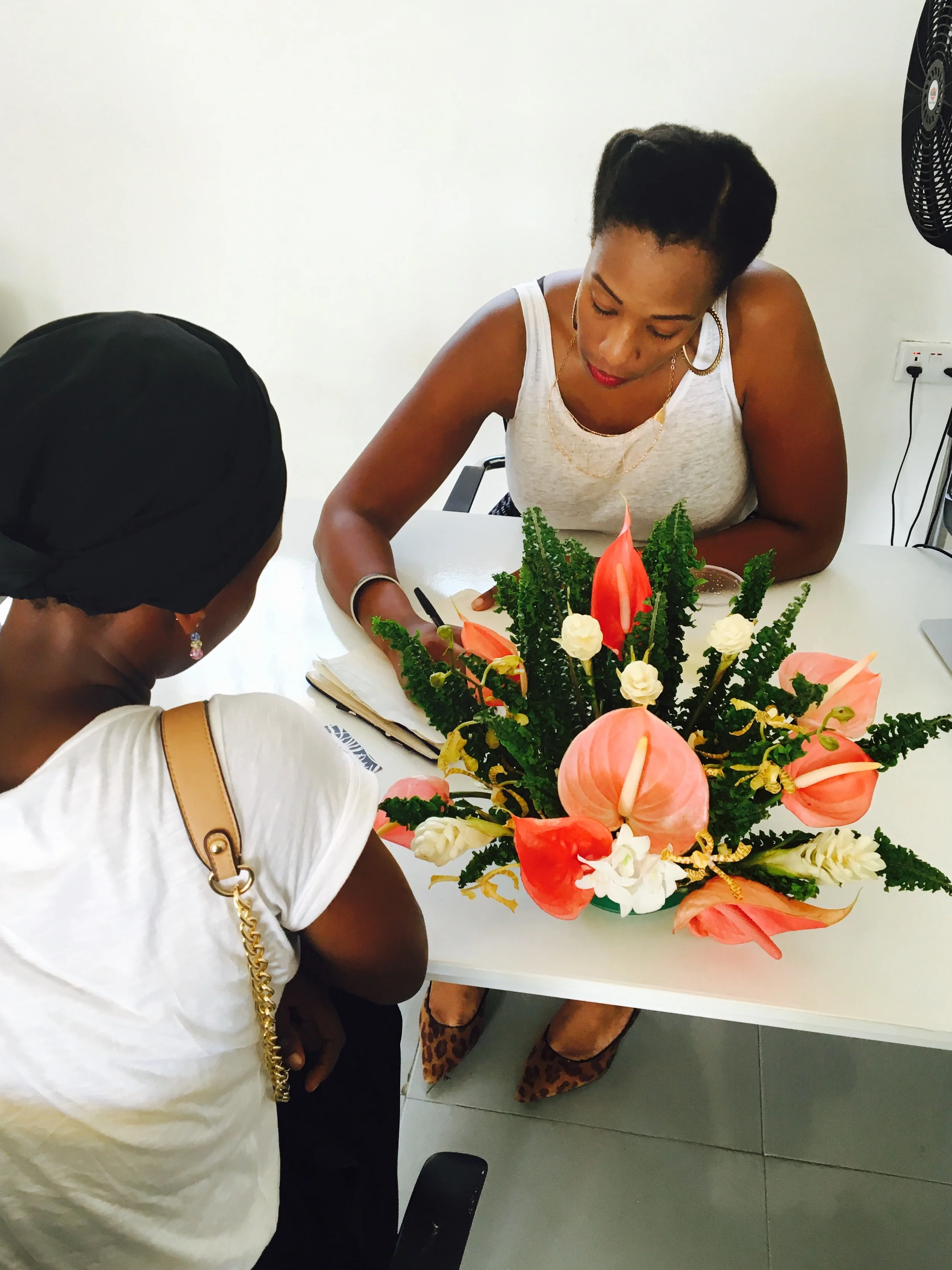 Madonna sketching a bespoke design for a client.