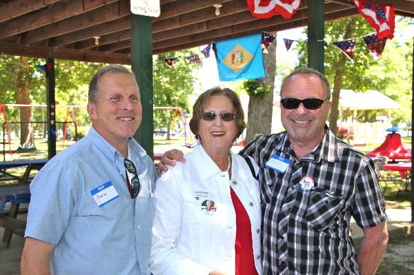 Sussex Democratic Party chairman Mitch Crane (right) with candidate Shirley Price and Democratic activist John Workman.