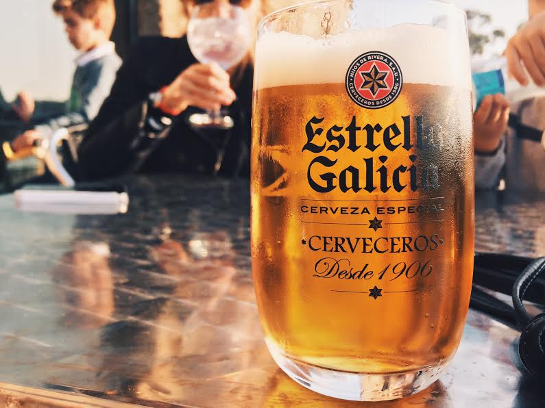 5.15 / 8:06 post meridiem // This beer, Estrella Galicia, is brewed in A Coruna and is not only popular but it is also the only beer I see anyone drink. It's delicious, too. On Sunday, the family with their 2 friends from Seville and I went to Santa Cristina Beach. There are restaurants, bars, and a boardwalk that wraps around two sides of the beach. It seems that everyone and their dog, literally everyone's dog, was out walking. We got there around 7:30 and stayed til 9:30. People of all ages, solo or in groups, were drinking, walking, and enjoying the sunny day. Drinking a beer or a light cocktail on a weekday or Sunday evening is common here. Walking around town or the beach is a pastime that I wish was more popular in the states. The beach was breathtakingly beautiful. I will be visiting with my camera soon. 