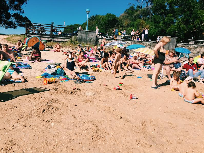 7.3 / 6:13 post meridiem // soooo not the best photo. HOWEVER, I was trying to secretly take a photo of the massive crowd on the beach. I failed because this doesn't even show half the people there and it's also sideways. The point, though, is there is another lady taking a photo and looking right at me which is very interesting. It's an intriguing photo nonetheless. 