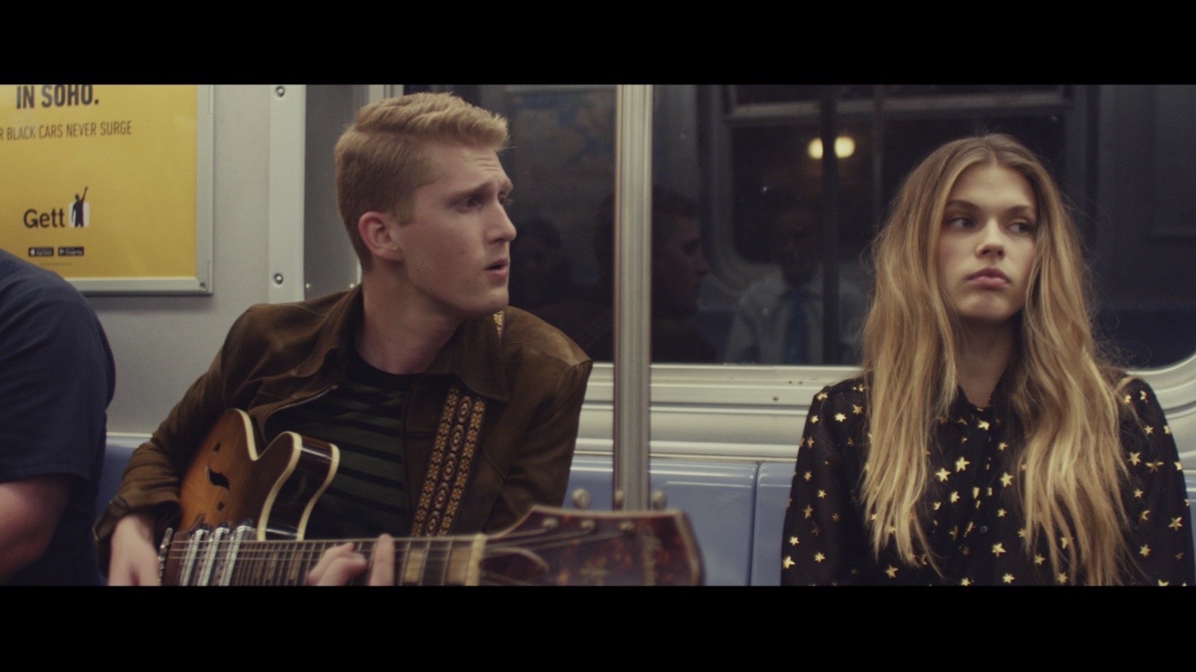 Victoria Lee and I on the tram. Still from the "Brooklyn" film. Directed by Warren Elgort.