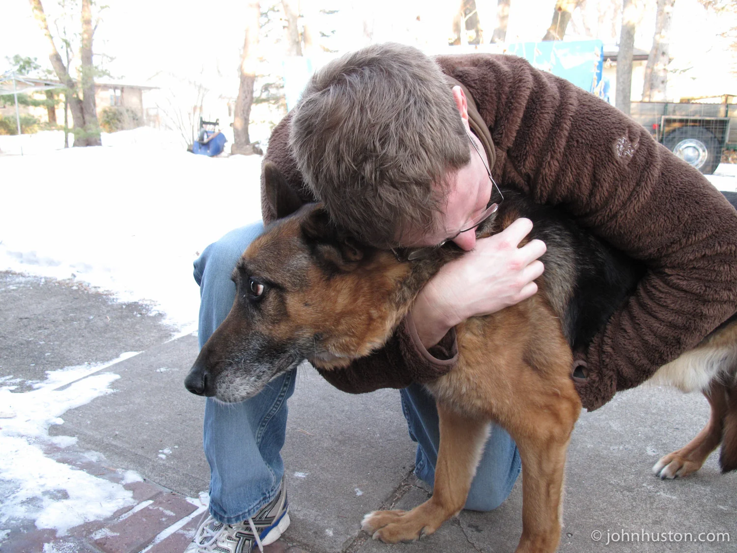 Tyler saying goodbye to his German Shepard, Bud.