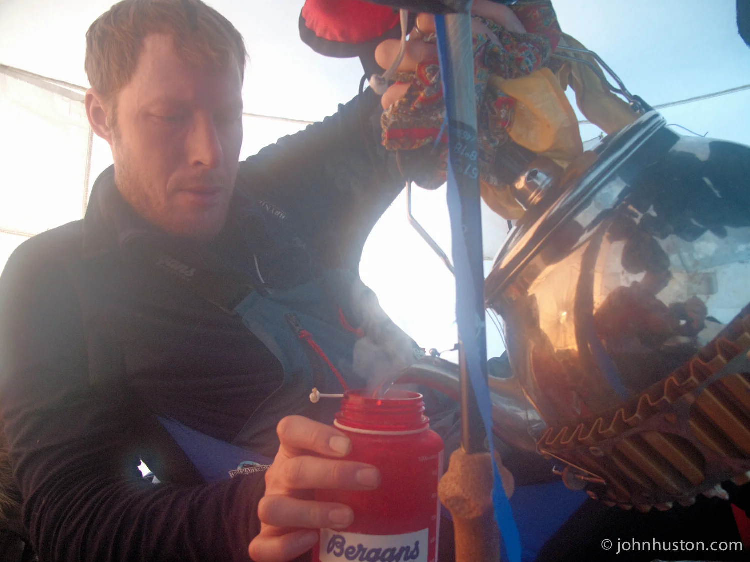 Tyler fills a water bottle. We love our 7L tea pot.
