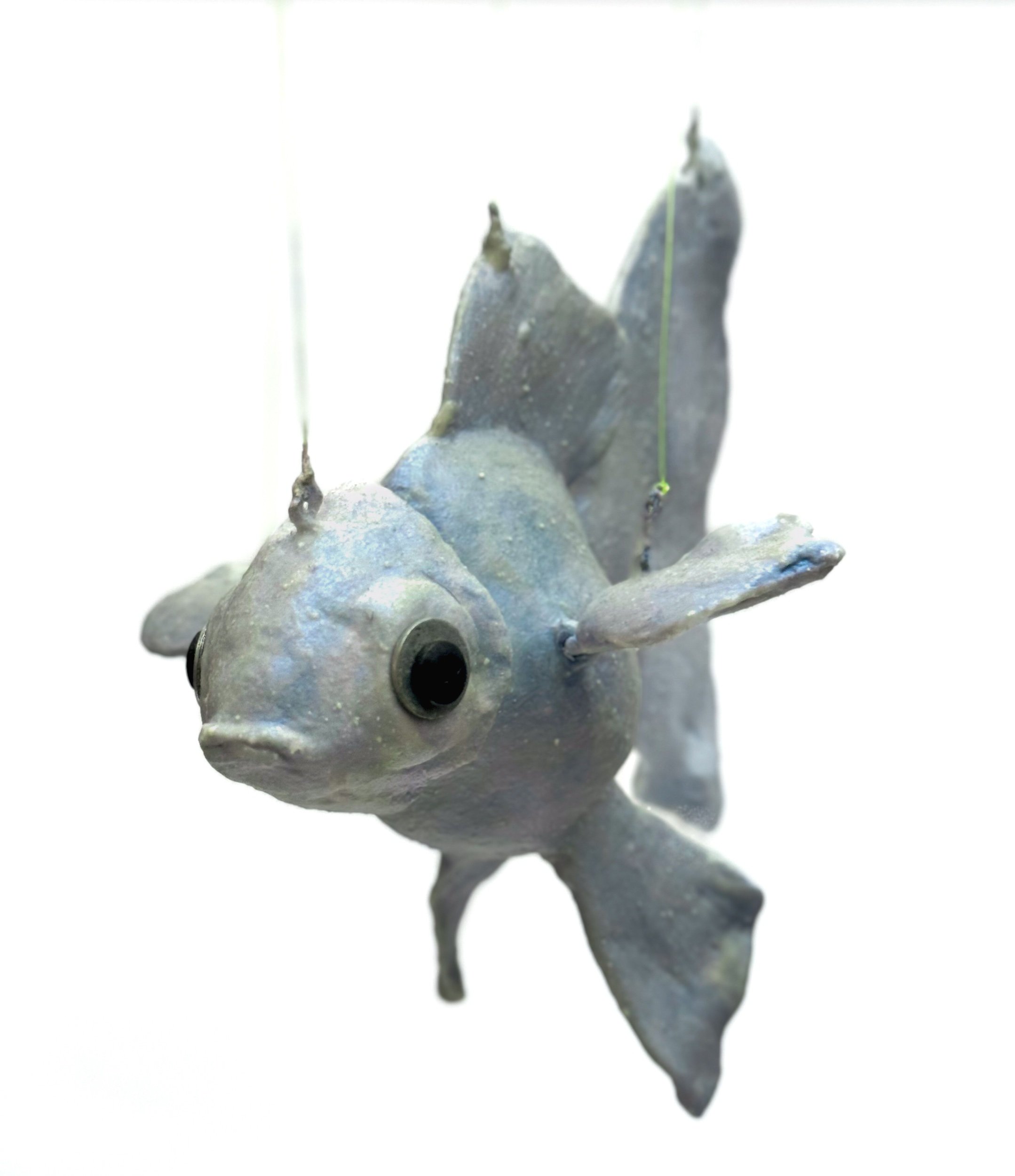 Fish (of Water detail) Wood, epoxy, foam, fasteners, glow-in-the-dark pigment. 8”x5”x”8”h, Marionette 2022