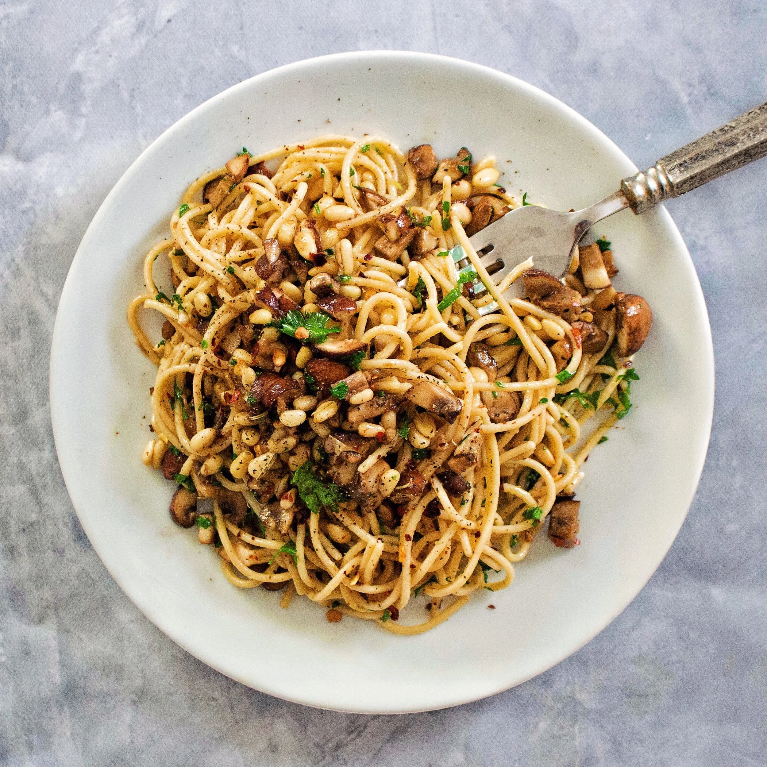 Chickpea Spaghetti With Mushrooms, Garlic, Parsley, and Pine Nuts
