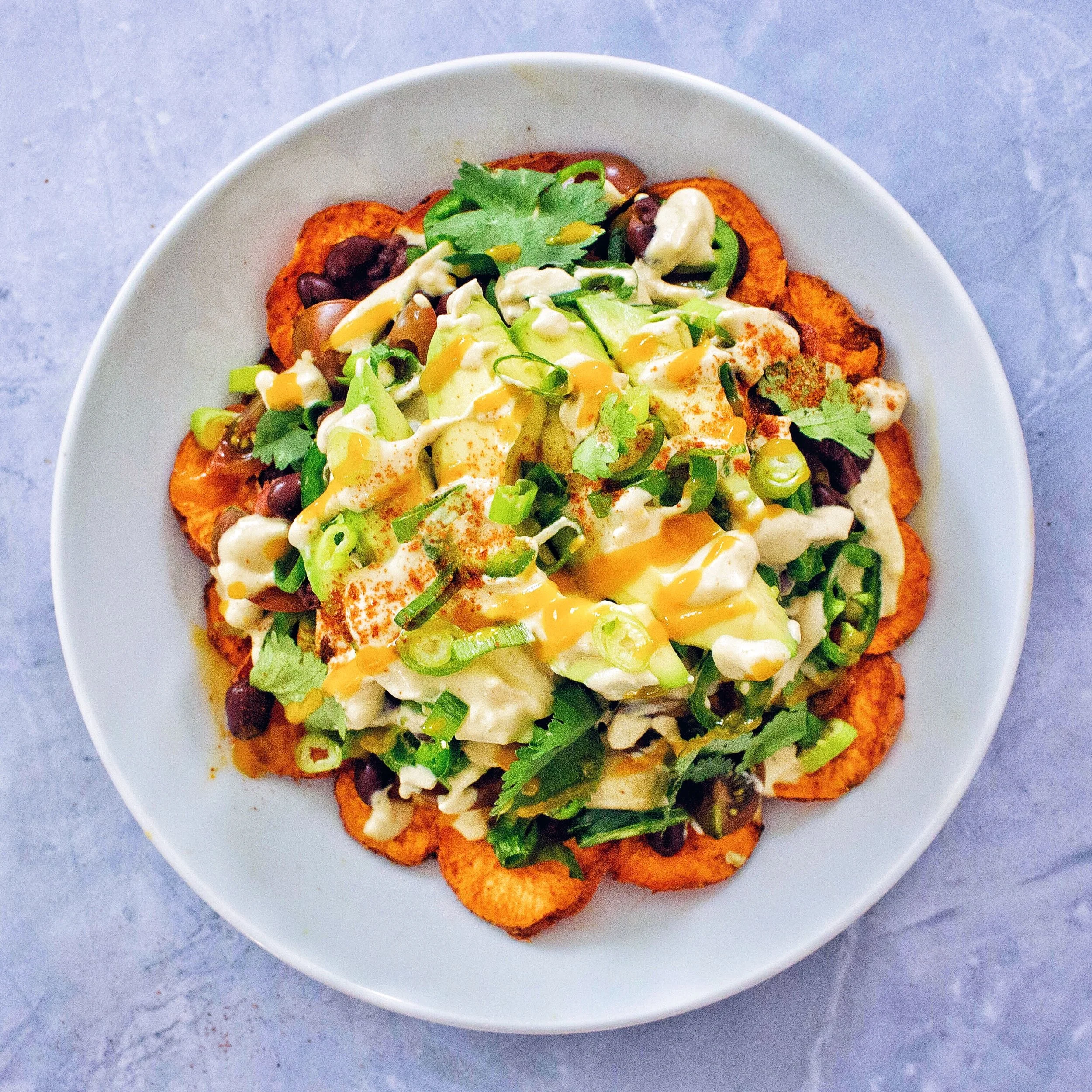 Vegan Sweet Potato Nachos with Spicy Queso