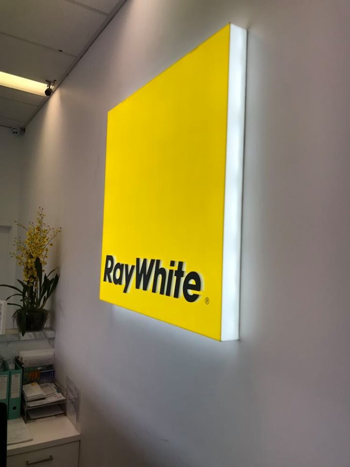 Ray White internal illuminated wall logo.jpg