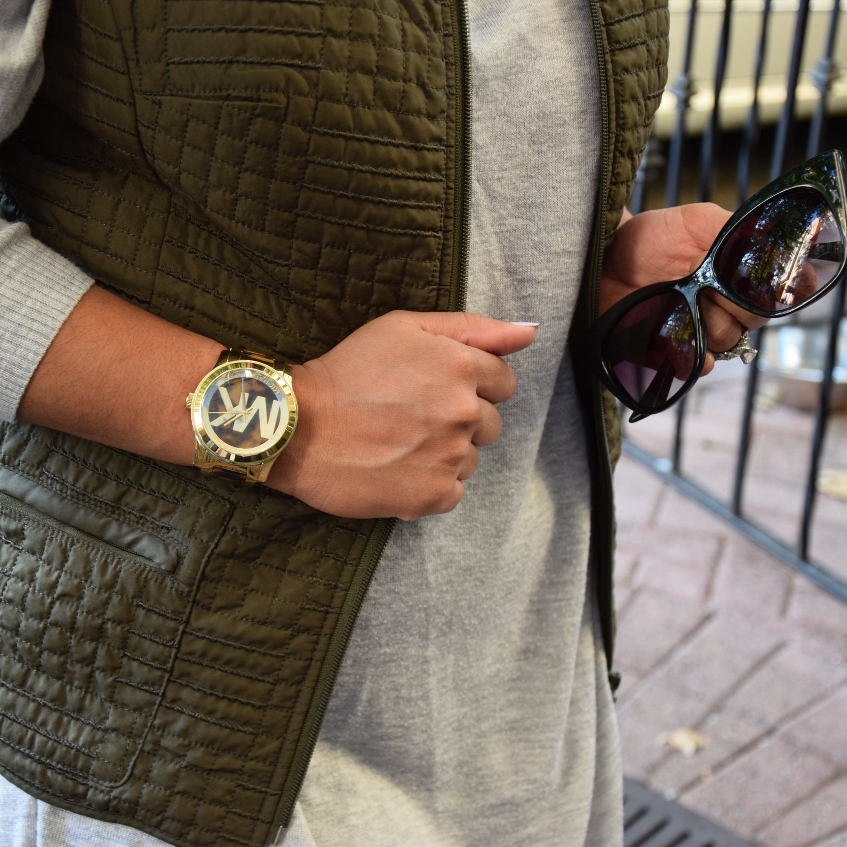 I love gold, so I added a gold and animal print MK watch as an accent to the army green vest and my bare forearms. 