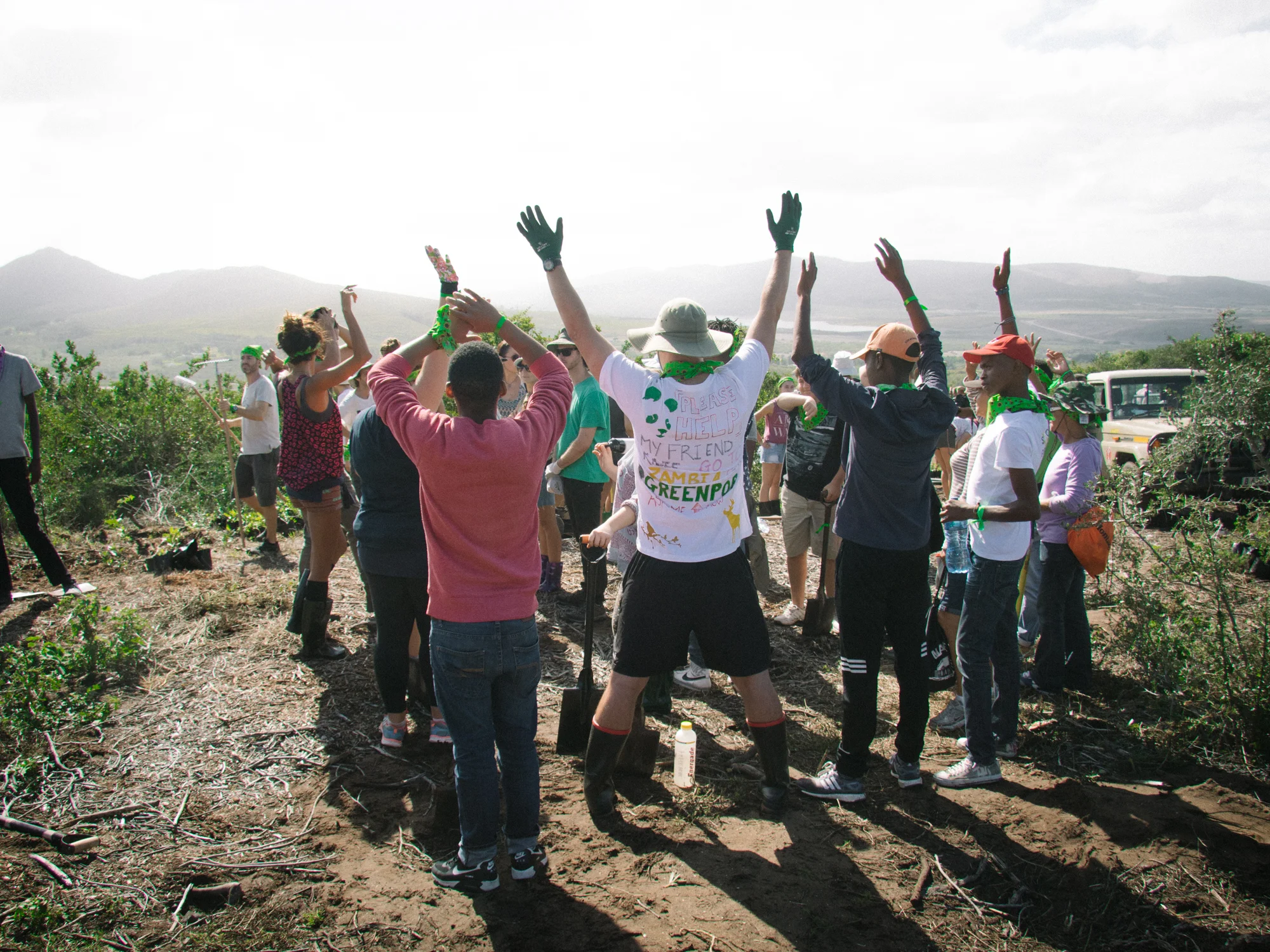 Members of the green planting team get excited to plant some trees