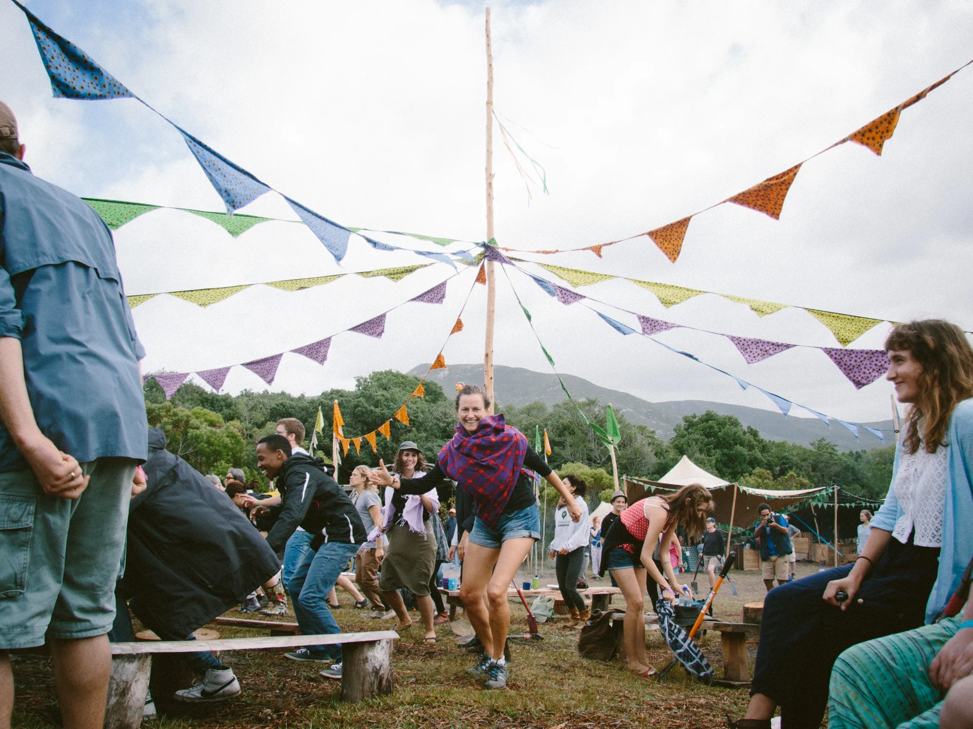 Participants at the Platbos Reforest Fest warm up for a day of tree planting with a dance party
